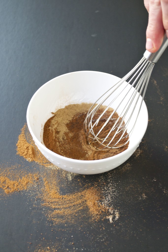 A bowl spices being whisked.
