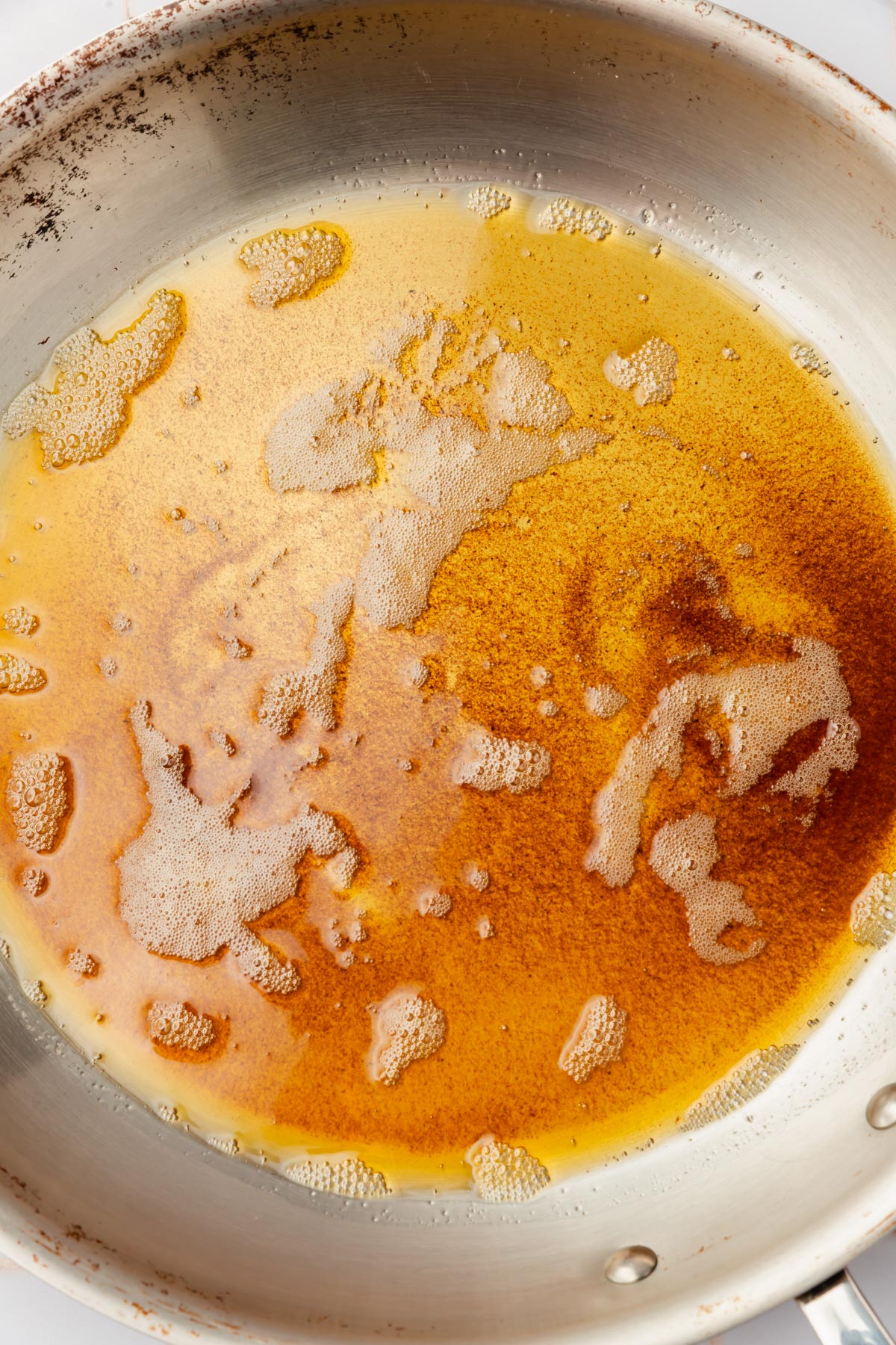 Browned butter in a skillet.