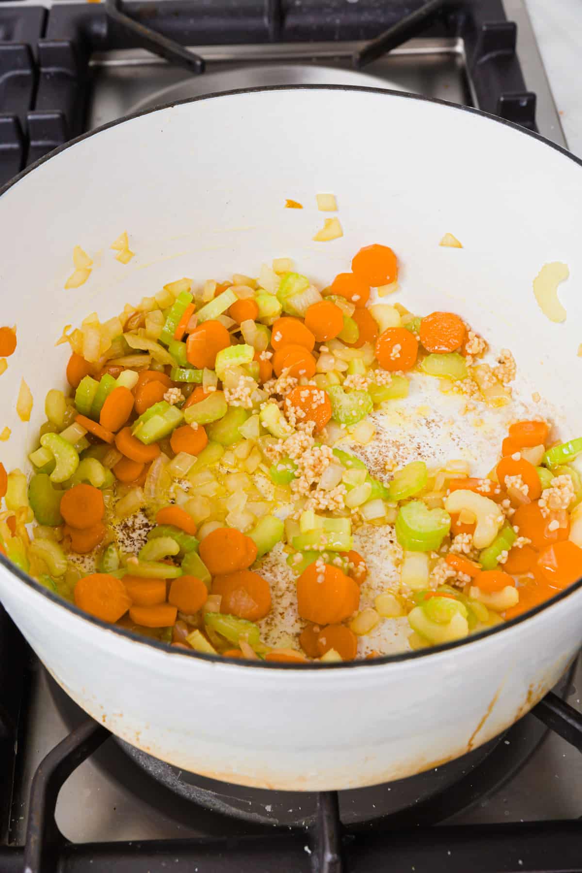 A white dutch over of diced celery, carrots, onion and minced garlic sautéed in olive oil.