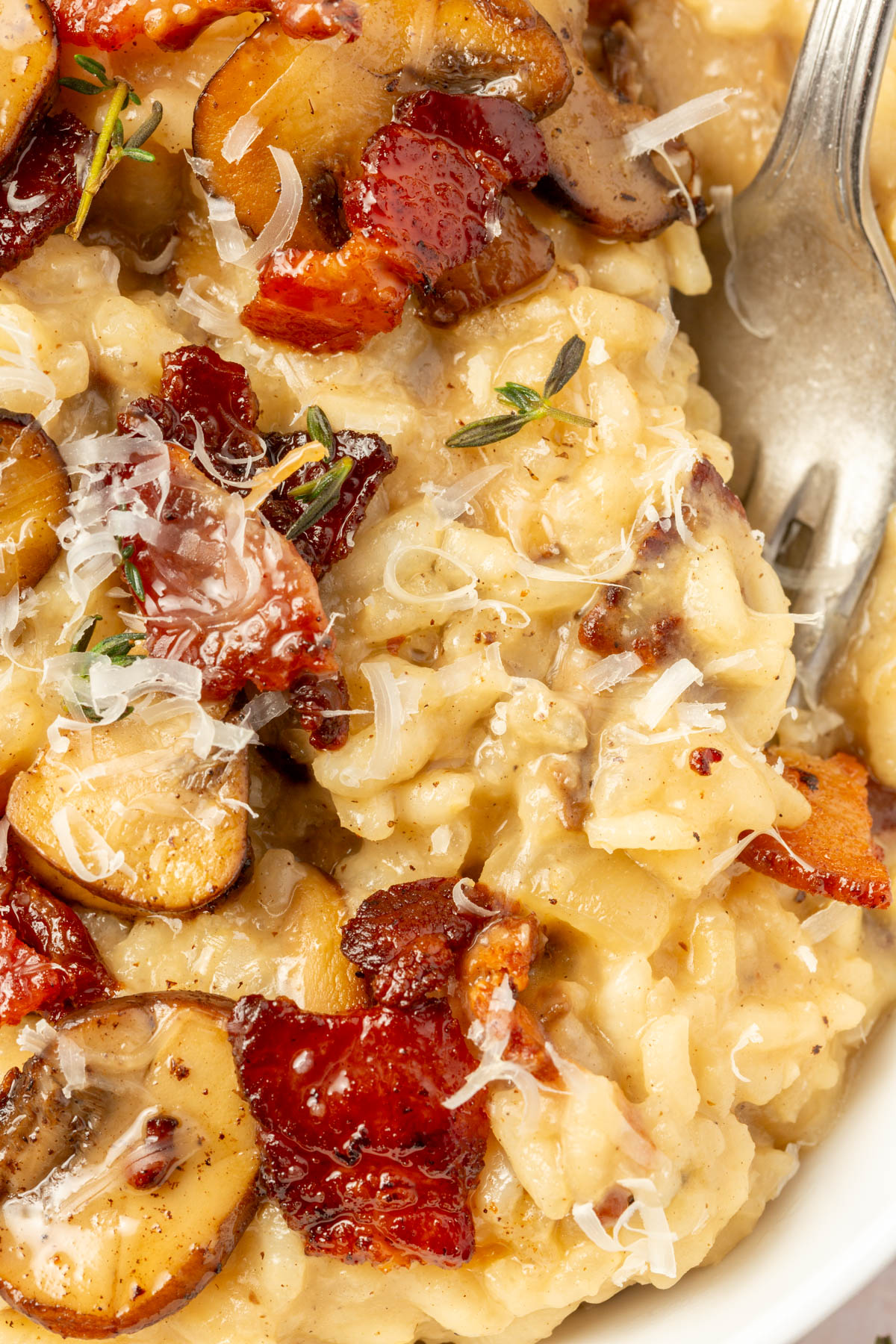 Close up image of finished bacon mushroom risotto.