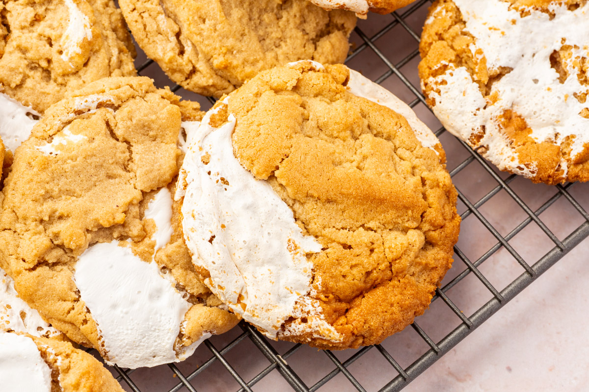 Close up image of gluten-free fluffernutter cookies on a cooling rack.