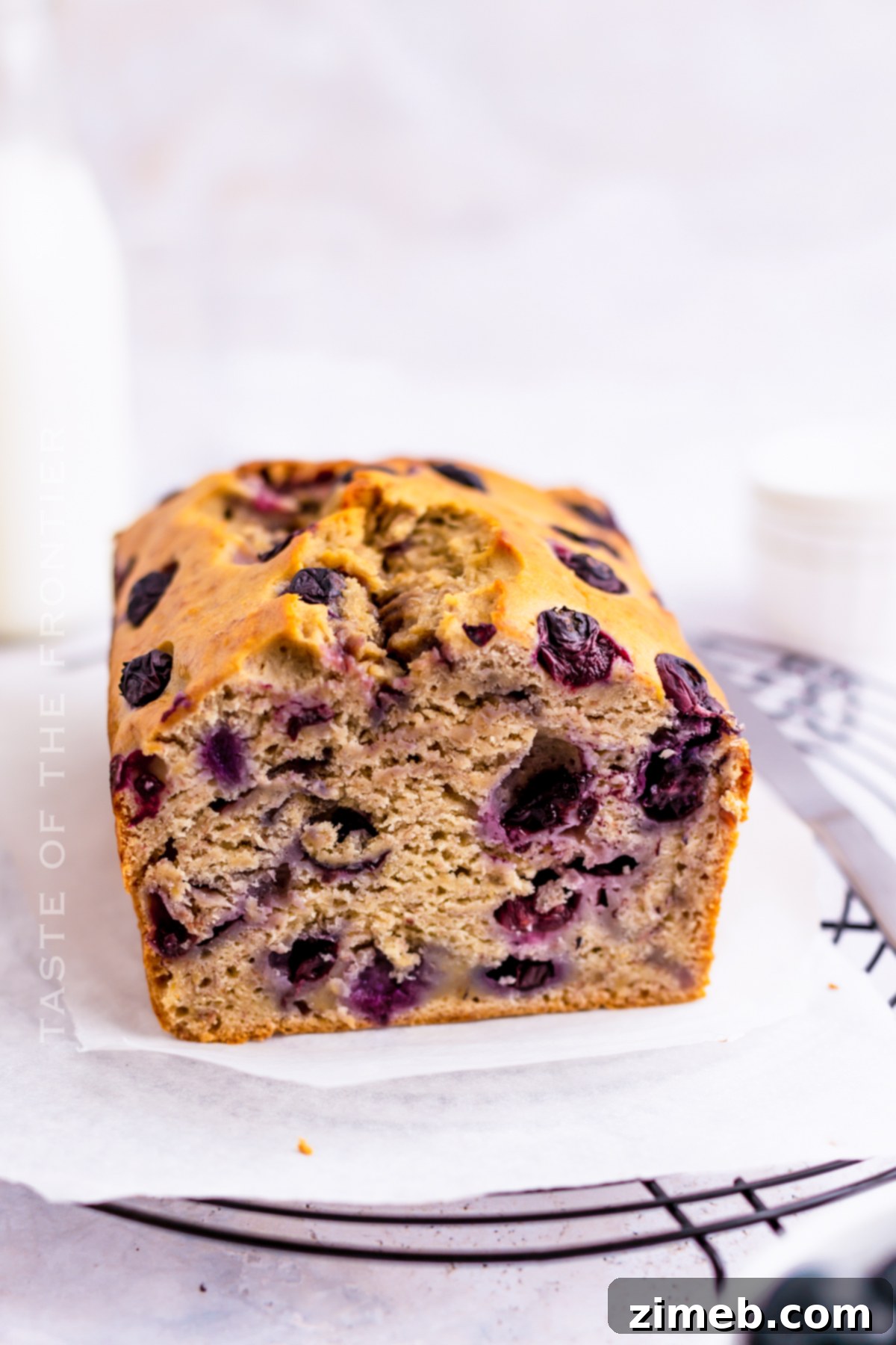 Golden Banana Blueberry Loaf 3 Freshly baked banana blueberry bread, perfect for morning recipes