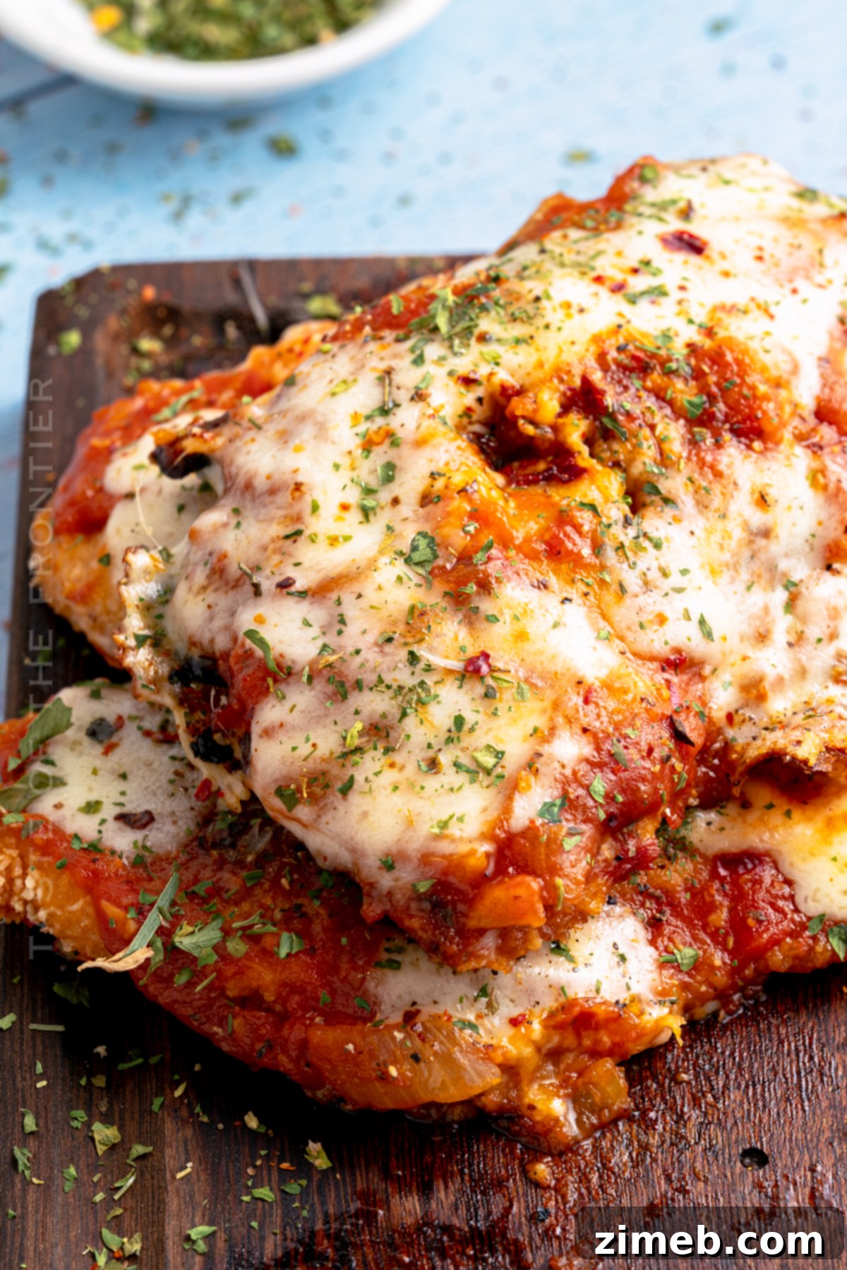Crispy baked Chicken Parmesan dinner ready to serve.