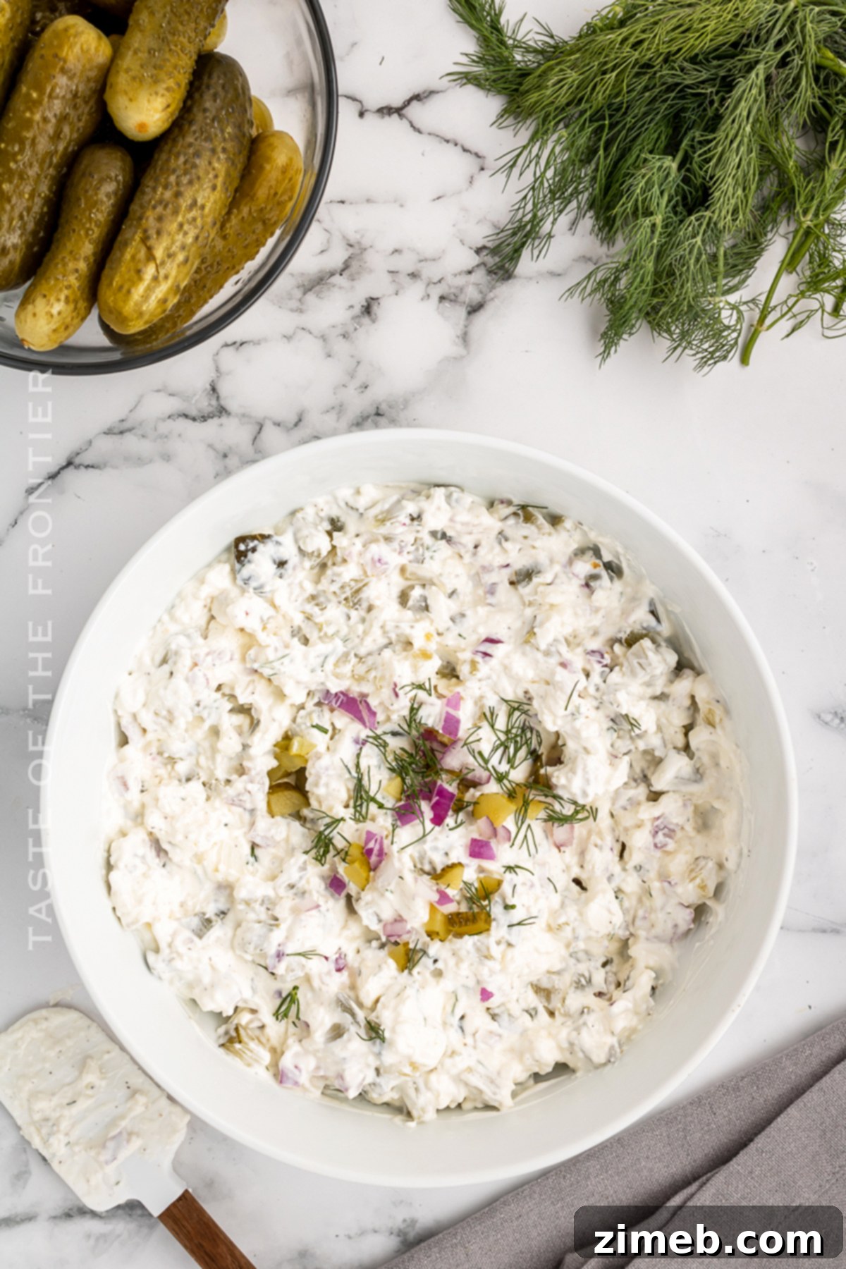 Zingy Dill Pickle Dip 7 Serving dill pickle dip at a party