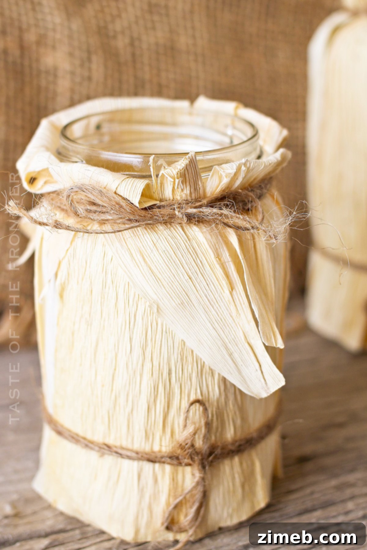 Beautifully glowing corn husk luminaries adding warmth to a fall setting