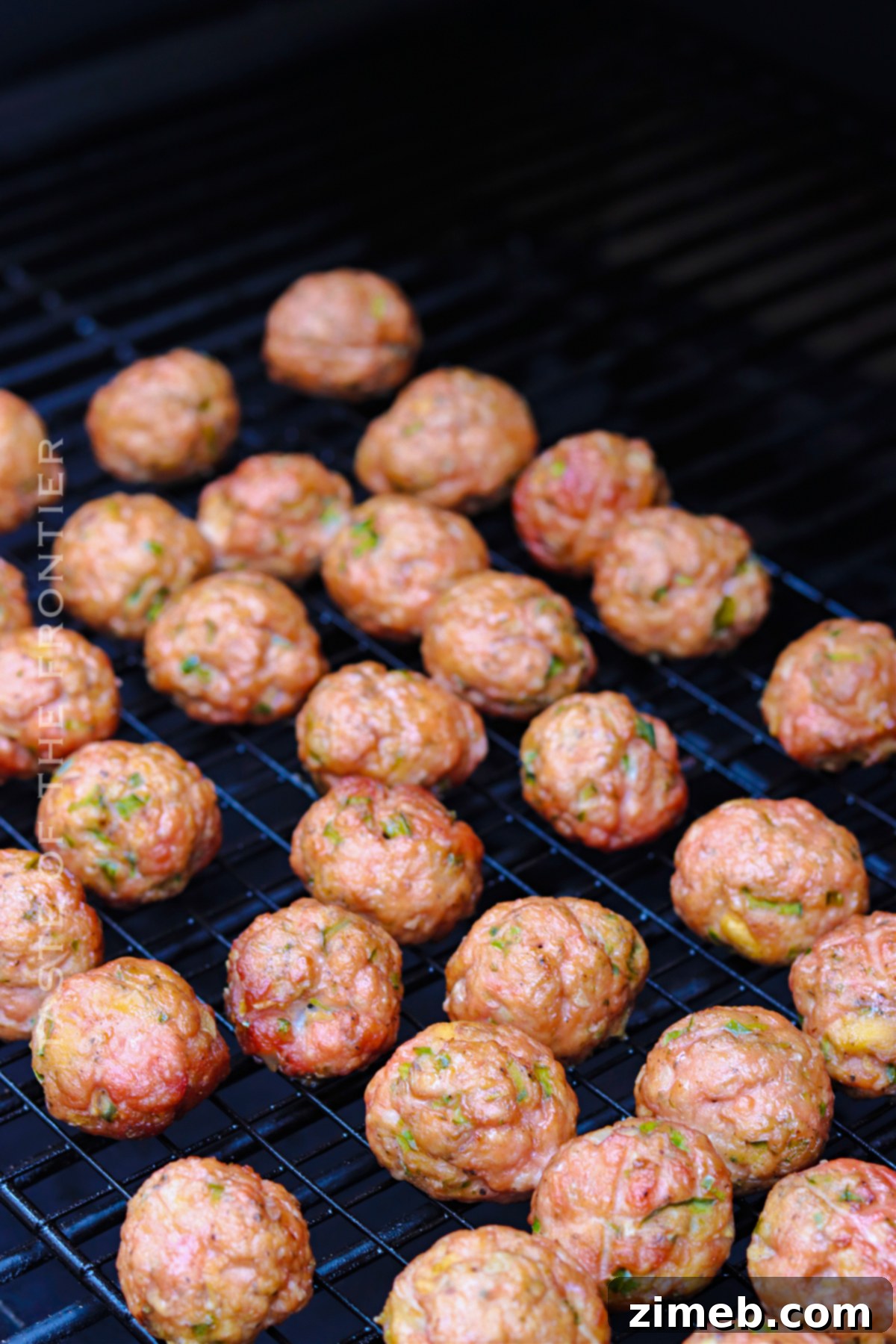 Slow-Smoked Meatball Magic 7 meatballs on the smoker