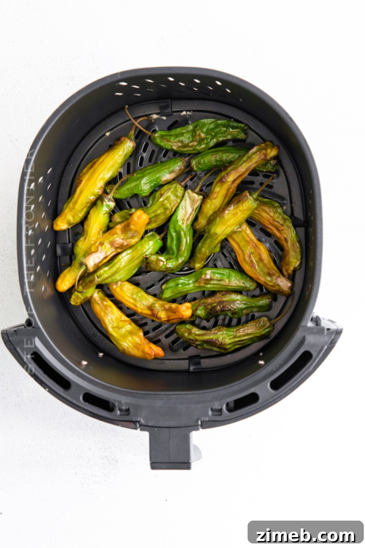 Blistered Air Fryer Shishito Peppers 7 Fried Shishito Peppers, ready to be served