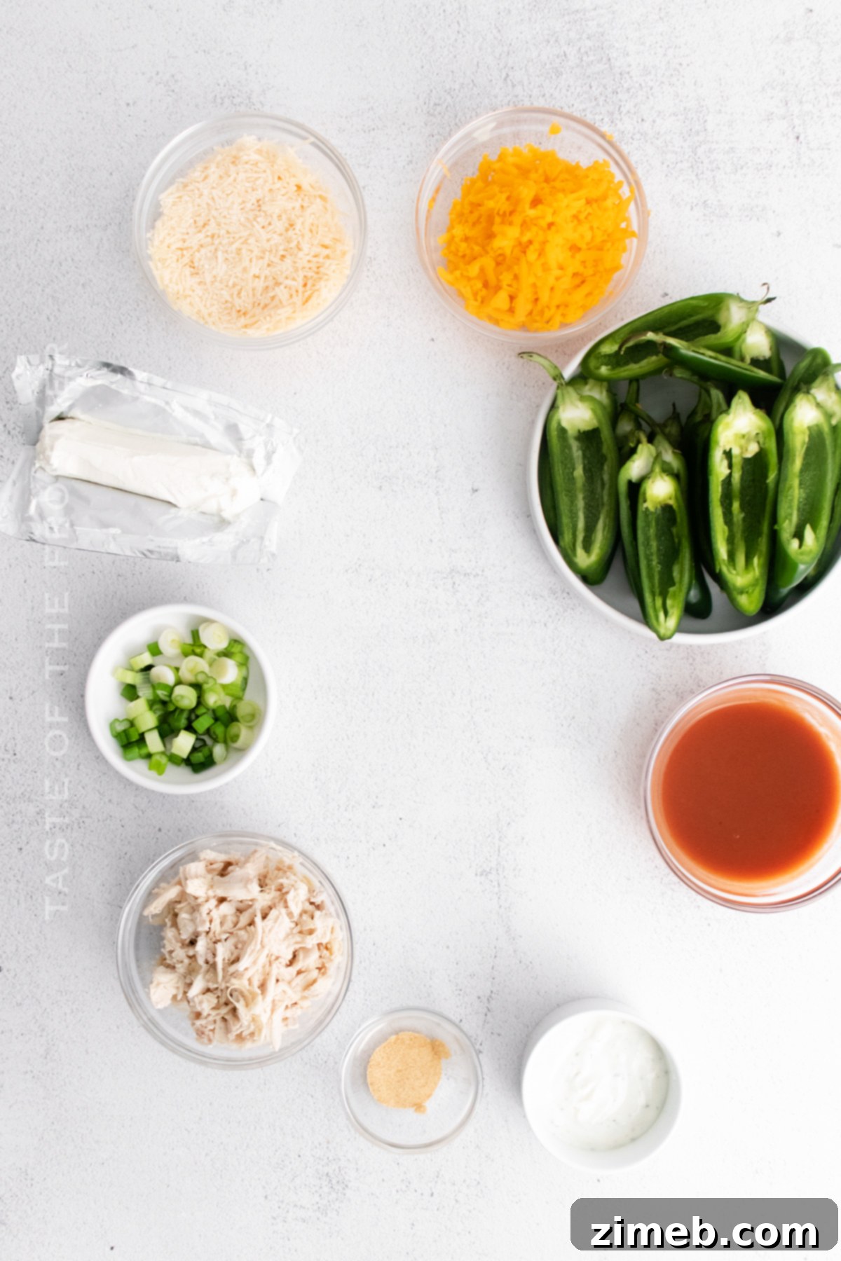 Ingredients for homemade Baked Jalapeno Poppers laid out on a table