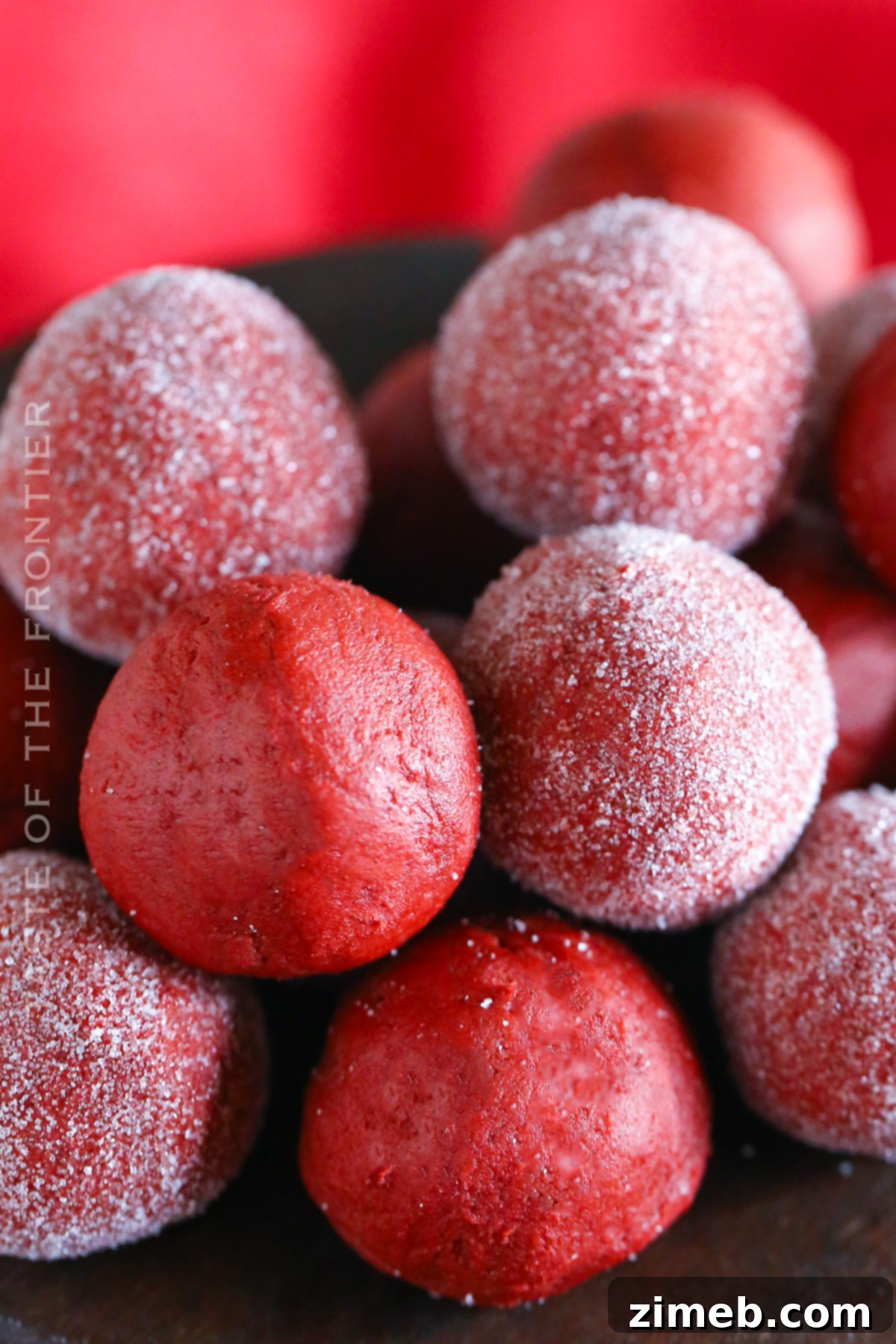 Velvet Ruby Indulgence 2 Sugar-coated red velvet truffles, an easy no-bake dessert made with cake mix and cream cheese.
