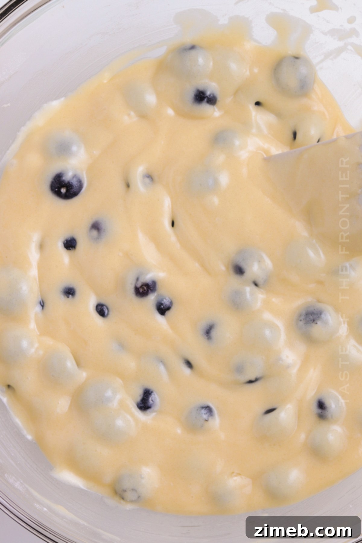Best Blueberry Muffin Recipe 7 Muffin Batter Mixture - Gently mixed wet and dry ingredients with blueberries.