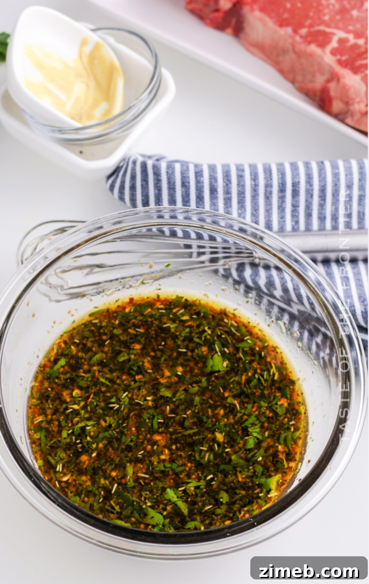 The Only Steak Marinade You'll Ever Need 6 Raw beef soaking in rich marinade