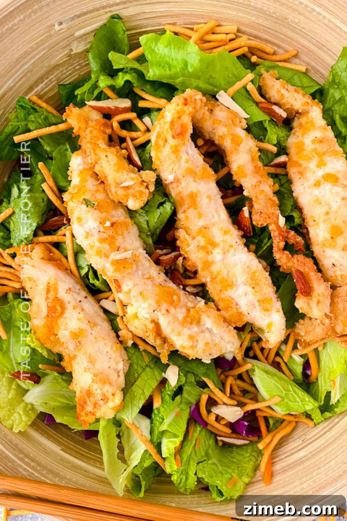 A vibrant Applebee's copycat Oriental Chicken Salad with crispy chicken, fresh greens, and creamy dressing.