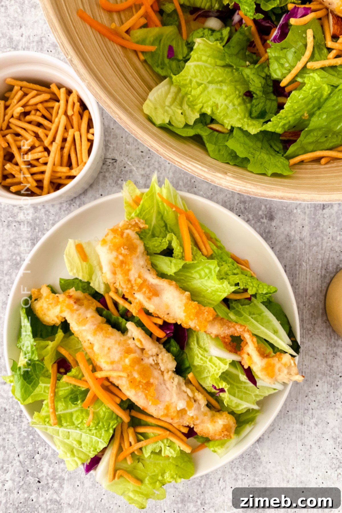 Close-up of the delicious Applebee's Copycat Oriental Chicken Salad, showcasing the crispy chicken and fresh vegetables.