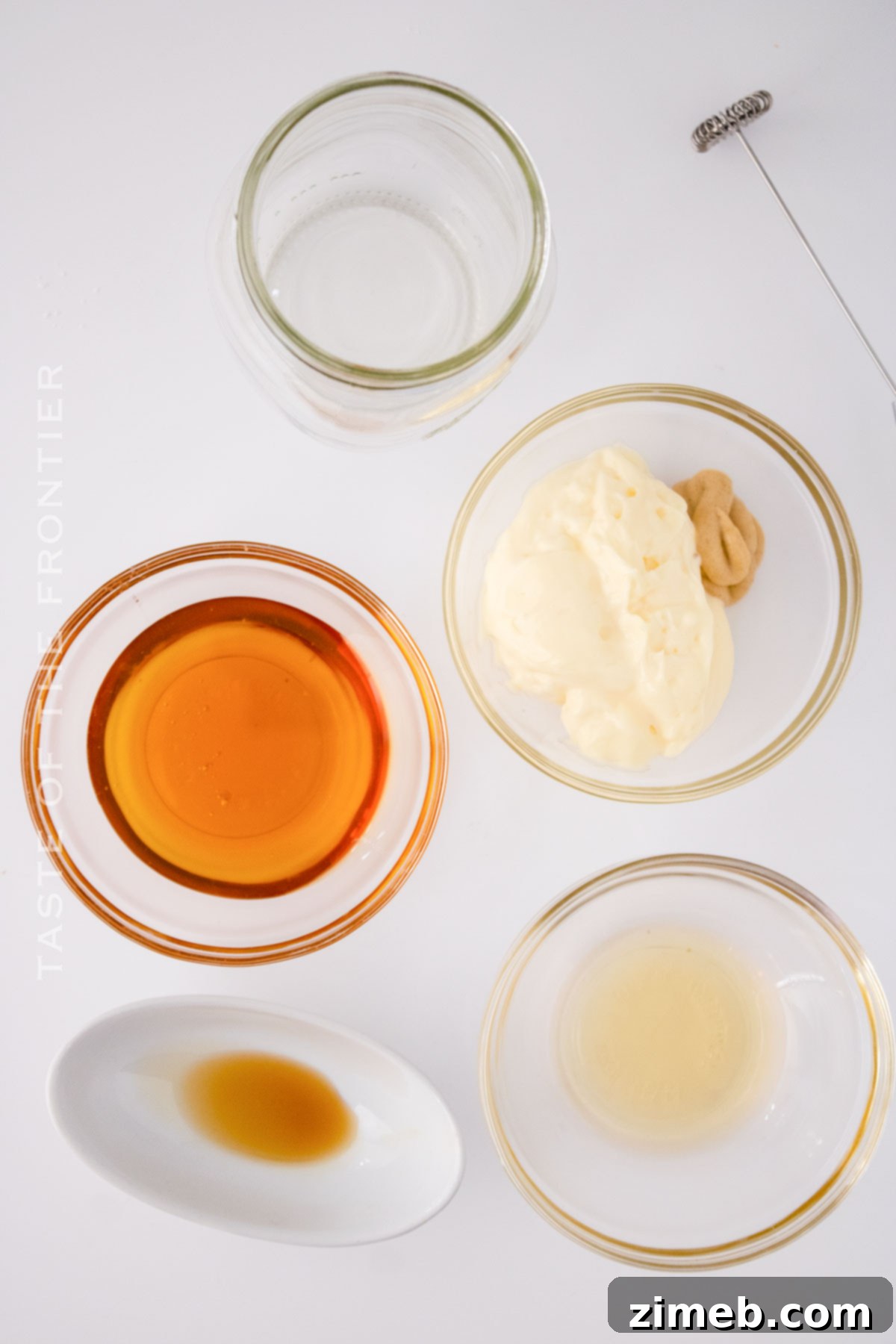 Close-up of the creamy, homemade Applebee's Oriental Chicken Salad dressing in a bowl.