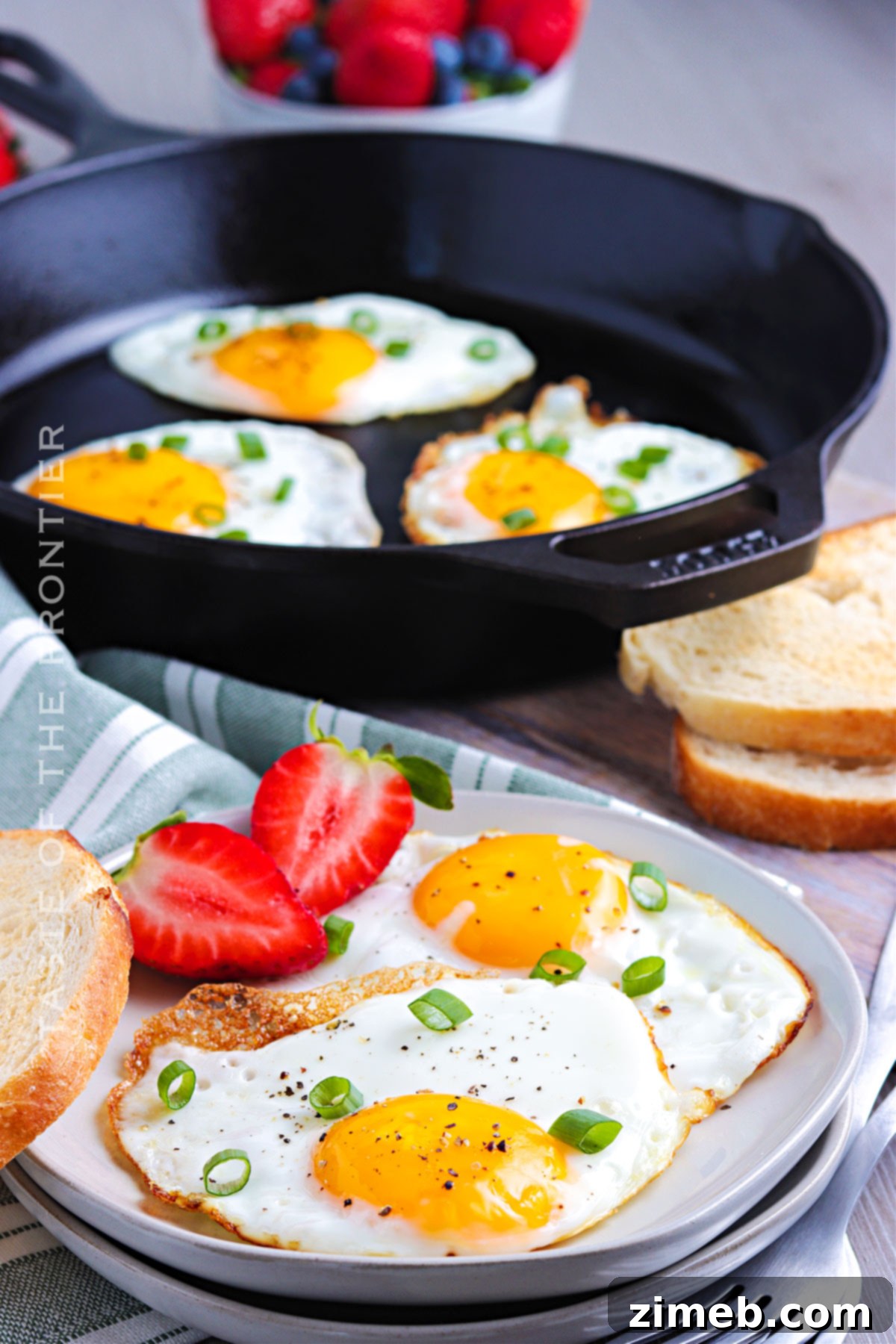 Delicious fried eggs in a skillet, ready for breakfast