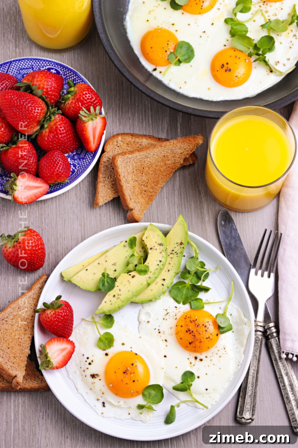 Sunrise on a Plate 7 Full egg breakfast with sunny side eggs and sides