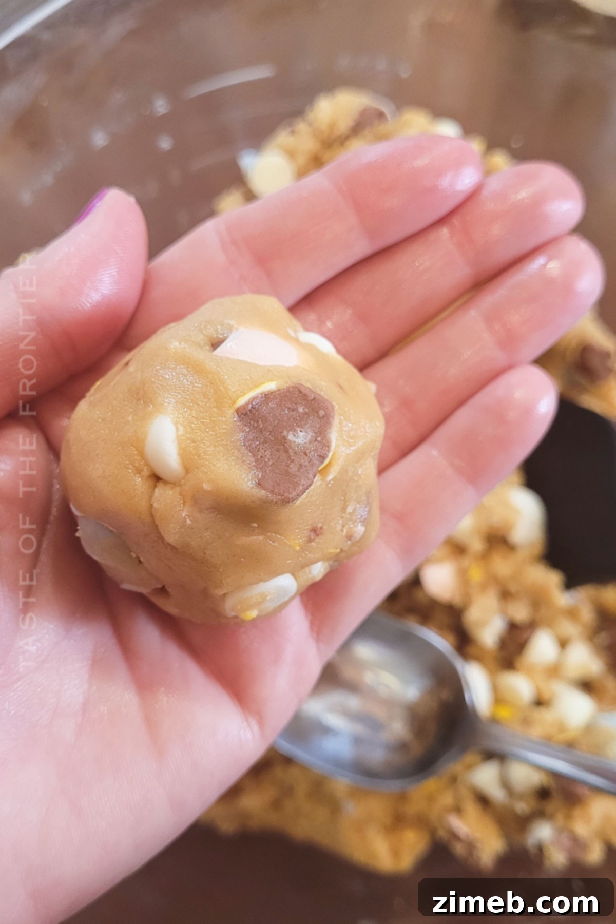 Rolling the Cadbury Egg Cookie dough into perfect spheres