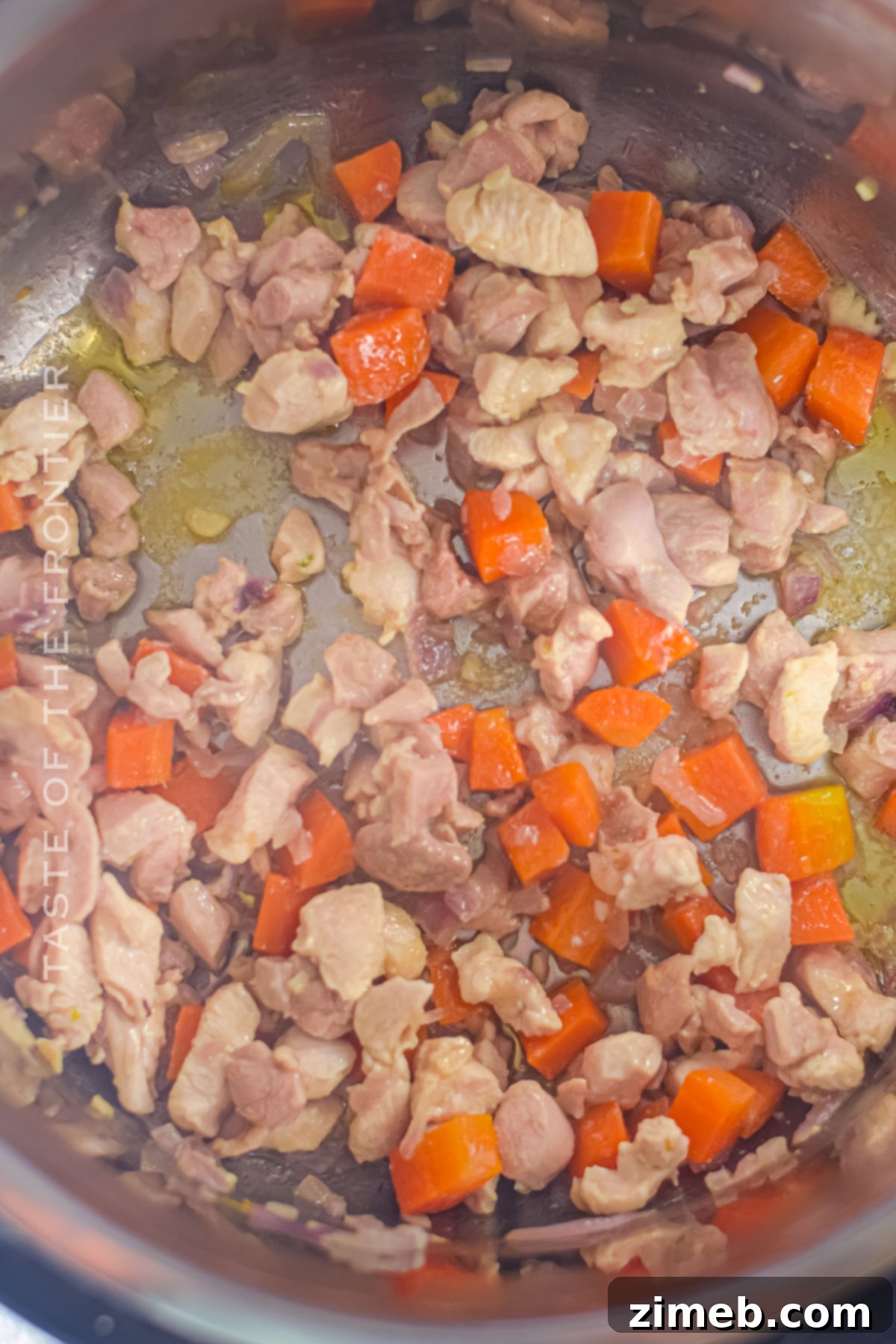 Easy Instant Pot Chicken and Rice 5 Chicken and vegetables being prepared for Instant Pot.