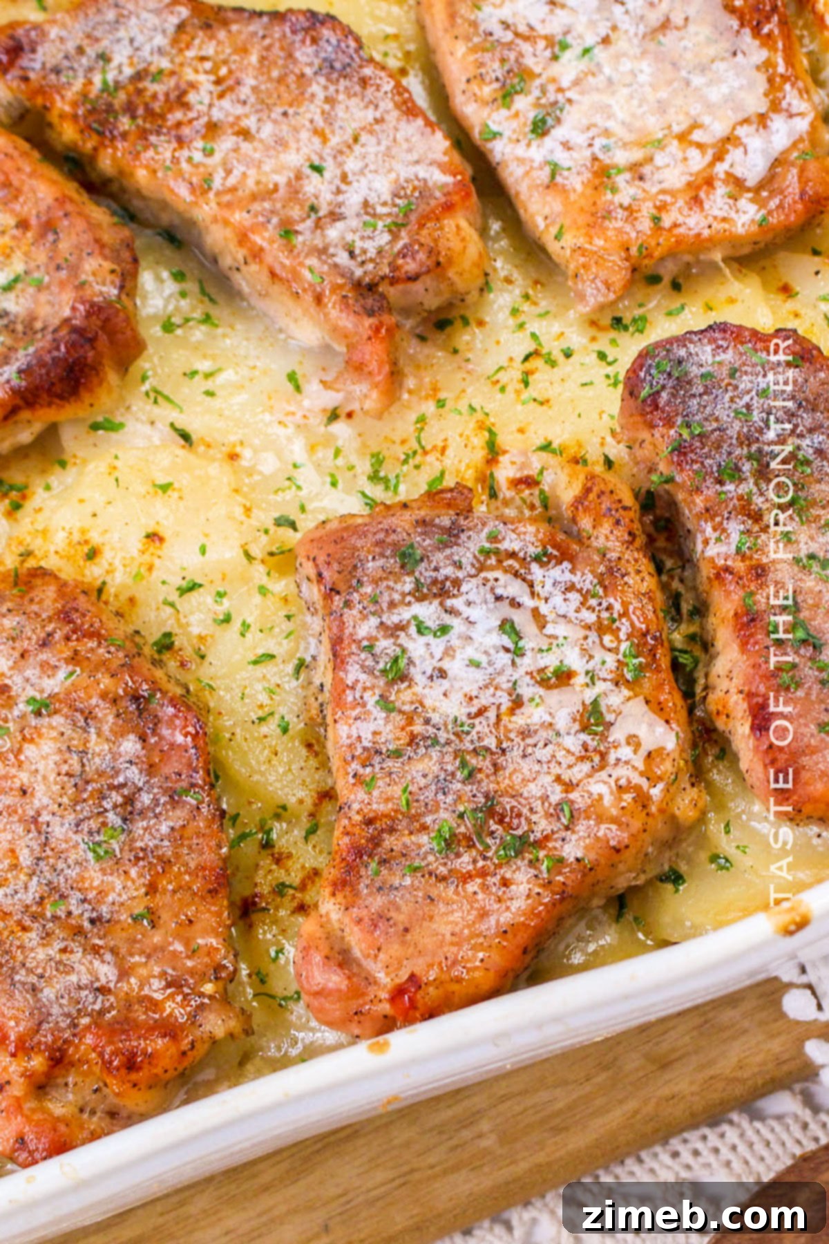 Hearty Pork Chops with Creamy Scalloped Potatoes 2 Pork Chops with Scalloped Potatoes Dinner
