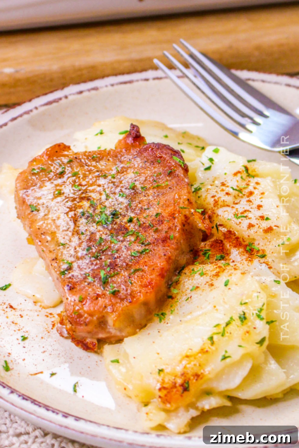 Hearty Pork Chops with Creamy Scalloped Potatoes 3 savory pork dinner with potatoes