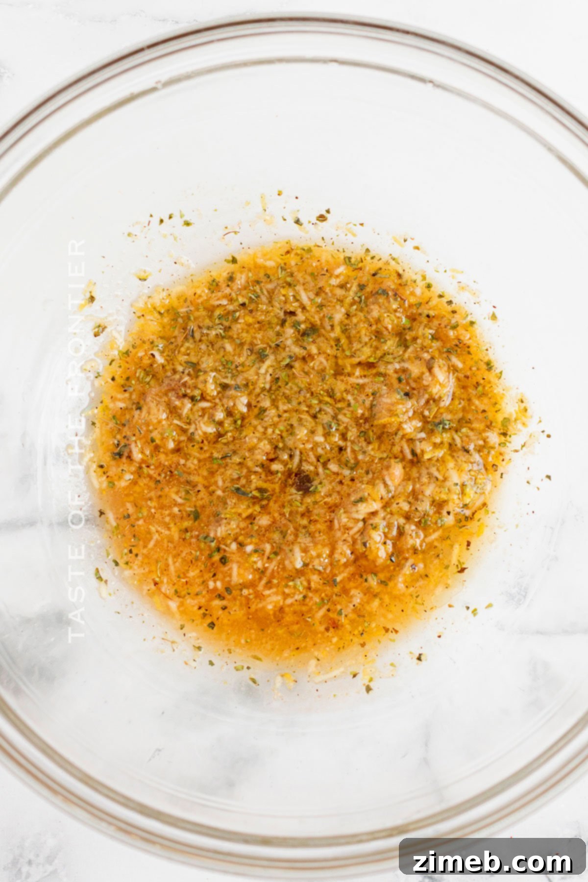 Closeup of butter sauce, not used in this chicken recipe but present in original content