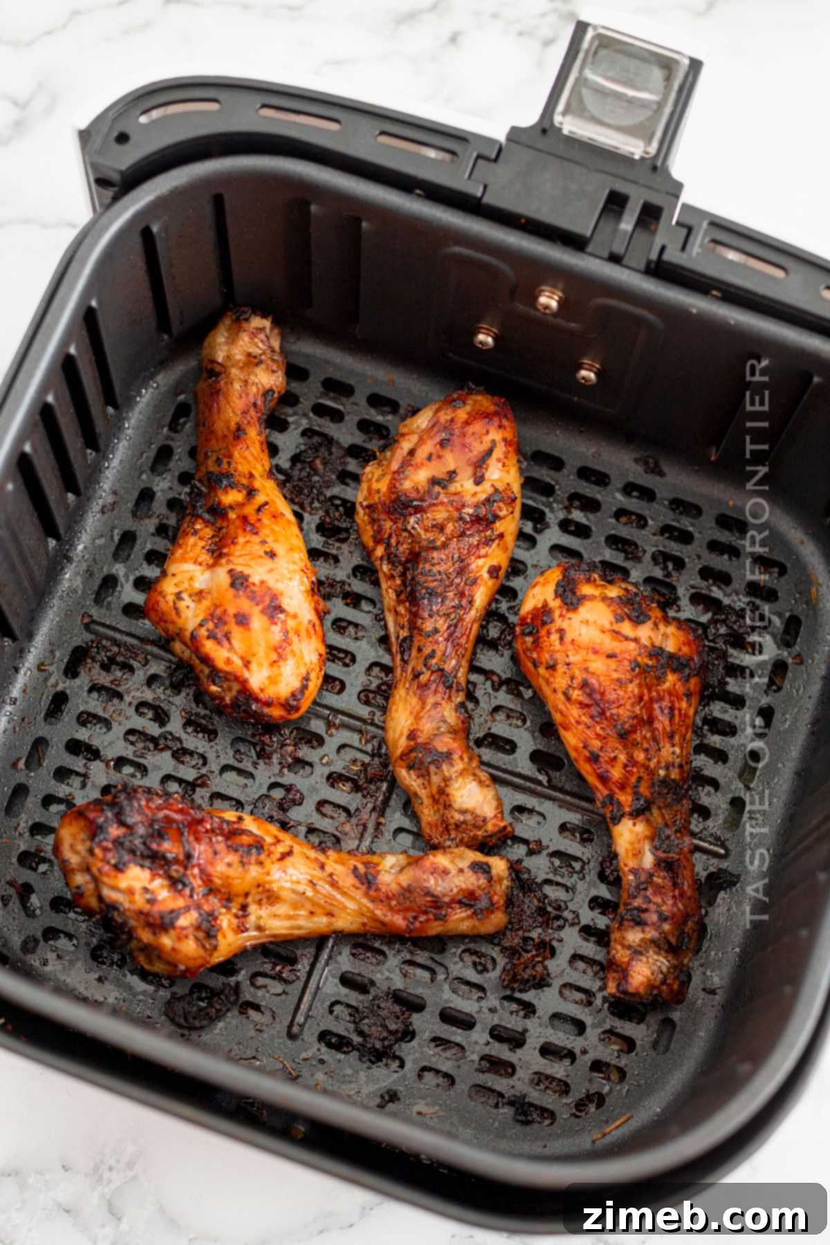 Air Fryer Chicken Drumsticks cooked to crispy perfection