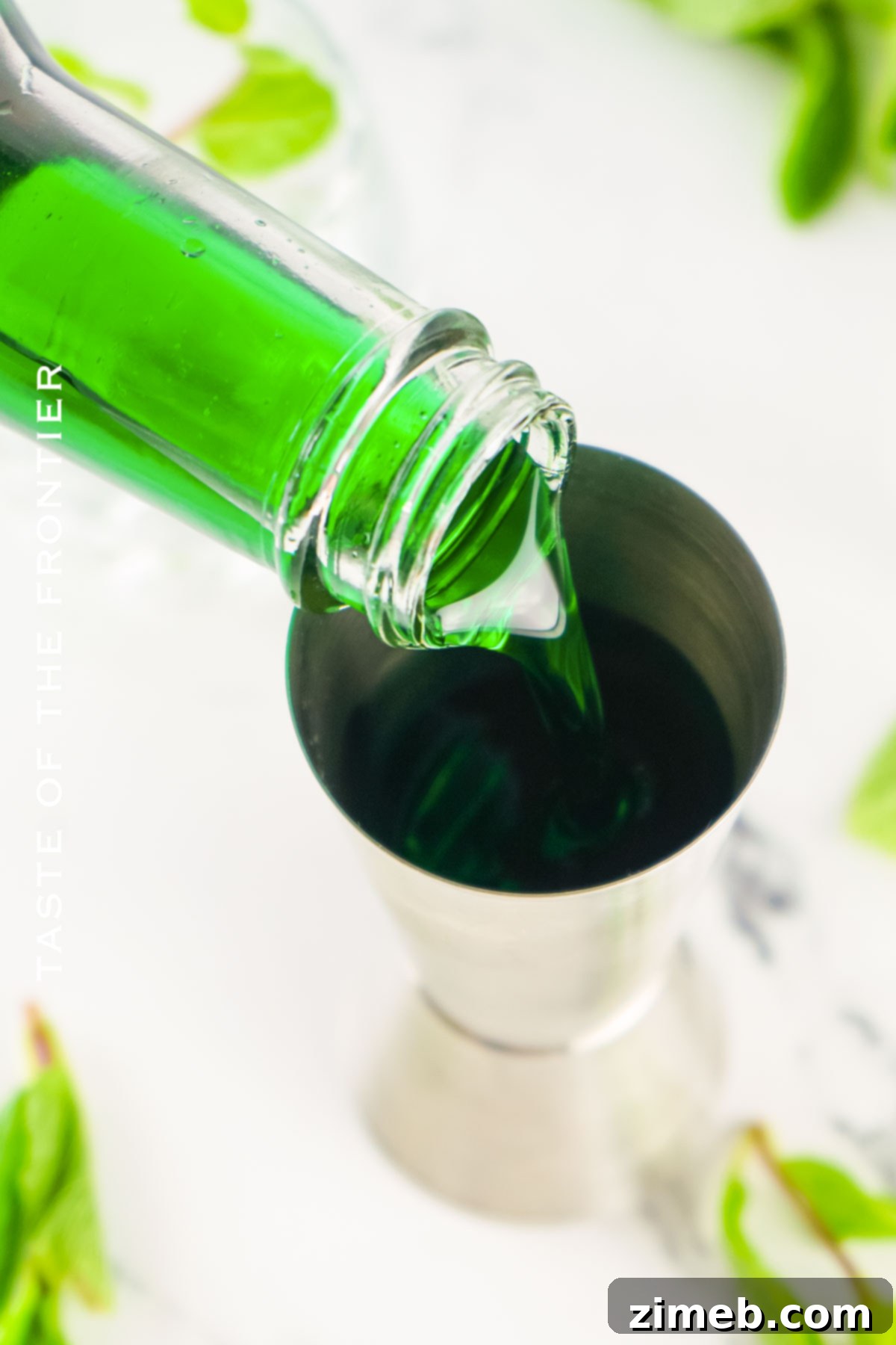 Midnight Thin Mint Shooters 5 A bottle of green creme de menthe liqueur, one of the key ingredients for Dirty Girl Scout Shots.
