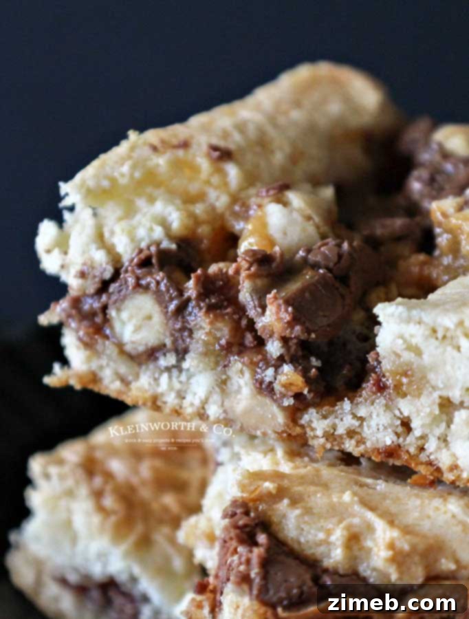 Snickers Dream Cake Bars 7 cake mix desserts - Snickers Cake Mix Bars
