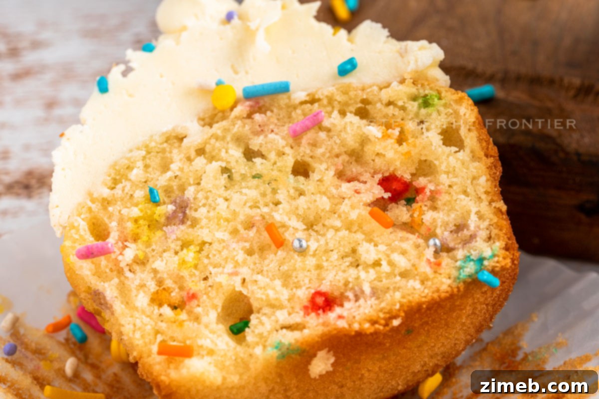 Festive Funfetti Cupcakes 15 Moist cupcakes with sprinkles - a close-up of a perfectly baked, moist cupcake with colorful sprinkles