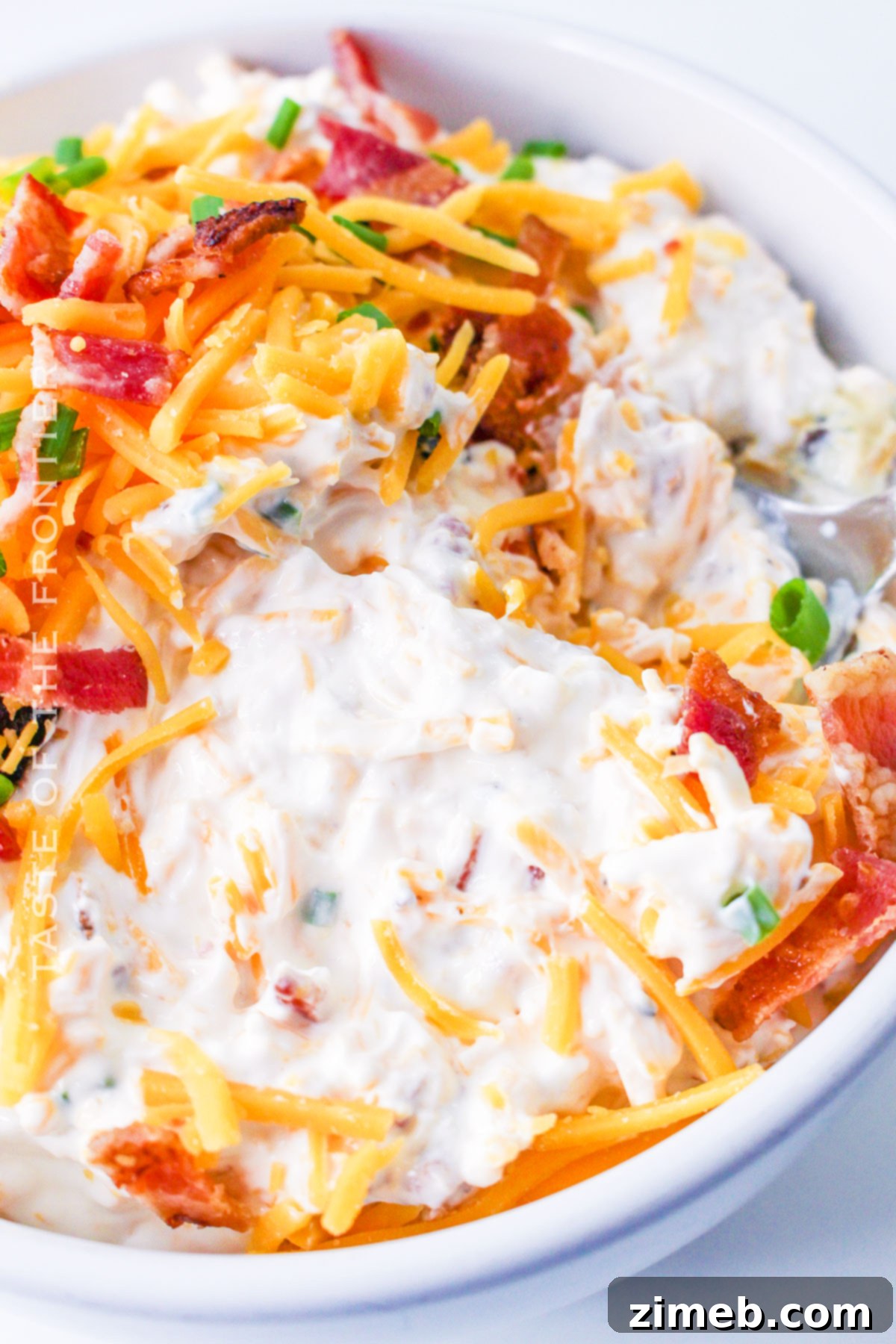 Craveable Loaded Baked Potato Dip 7 mixing cold dip