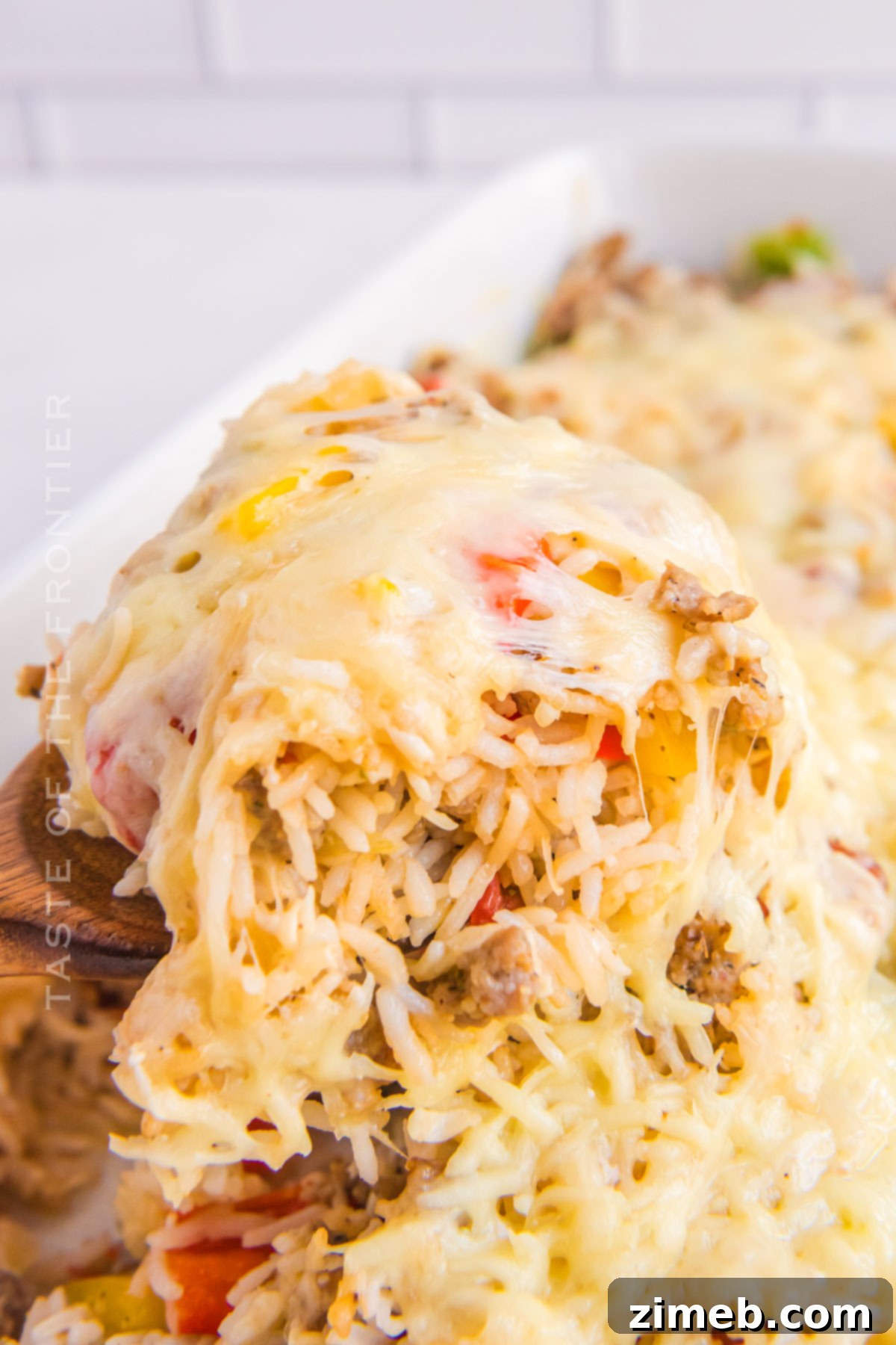 serving rice and meat casserole for dinner