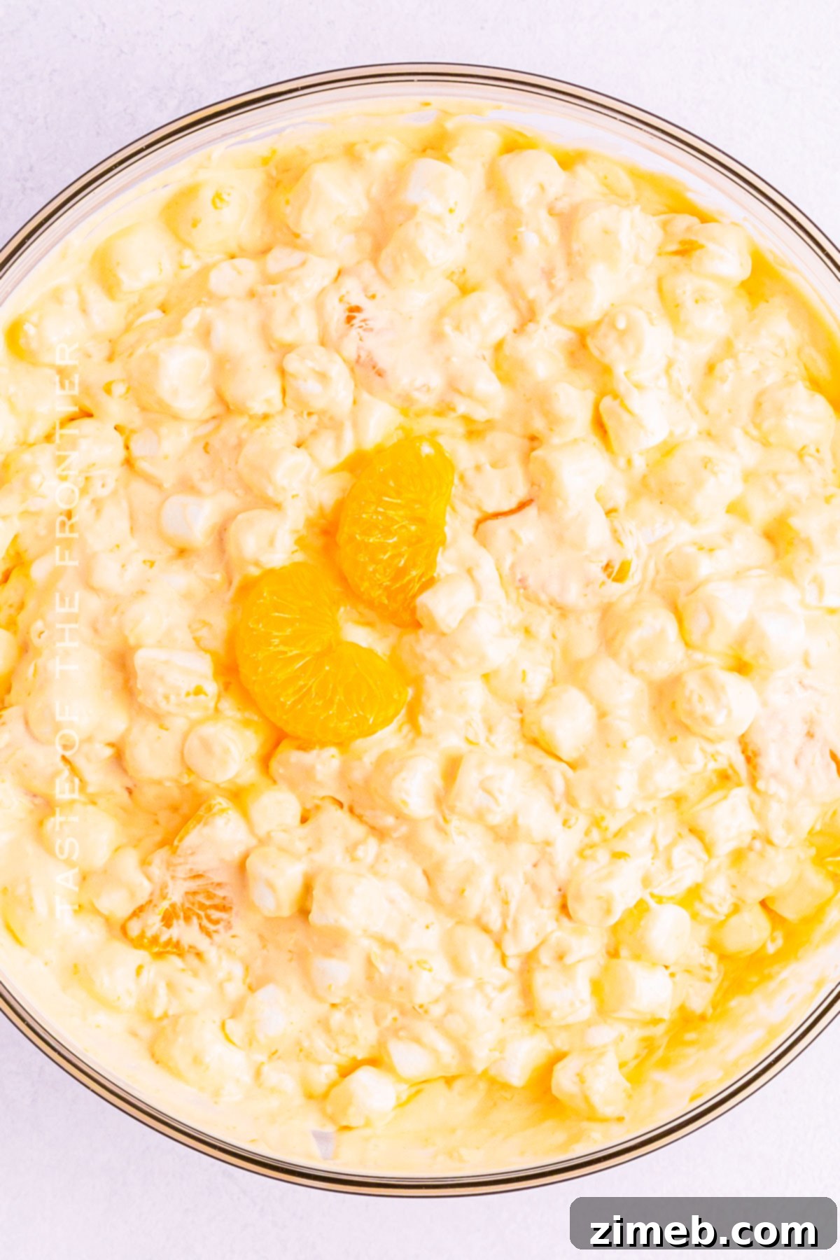 Citrus Cloud Delight 8 Orange Fluff Salad: a side dish with jello and marshmallows