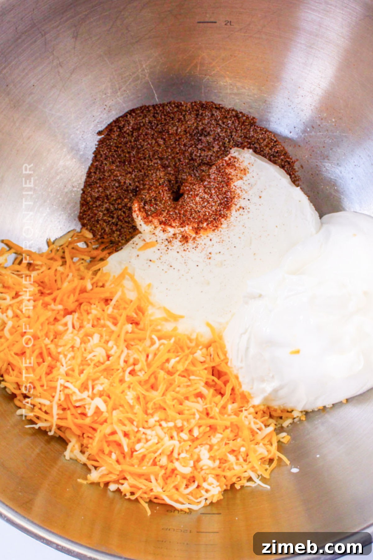Fiesta Chicken Bake 5 Creamy cheese and seasoning sauce in a bowl for the casserole