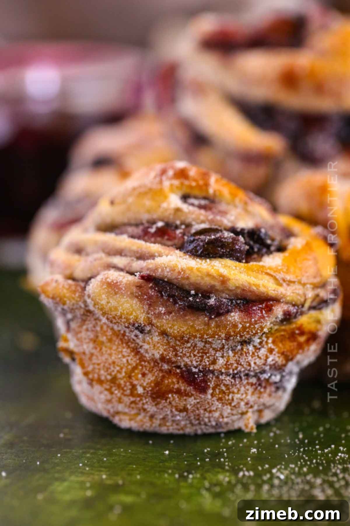 Blueberry Bliss Cruffins 3 Close-up of the best Blueberry Cruffin recipe, showing flaky layers and juicy filling.