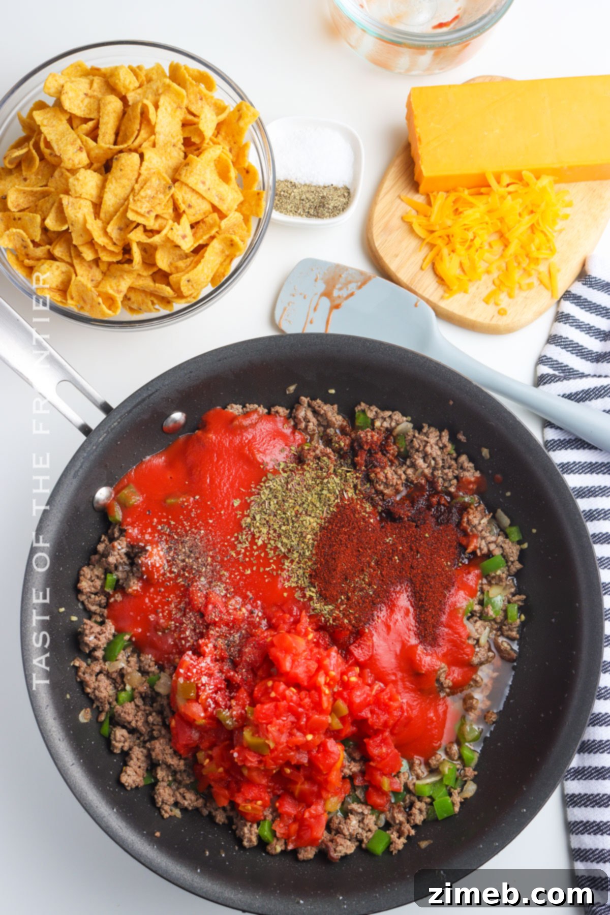 Chili Chip Comfort Bowl 5 Steps for how to make Frito Chili Pie with ground beef and chili simmering in a skillet