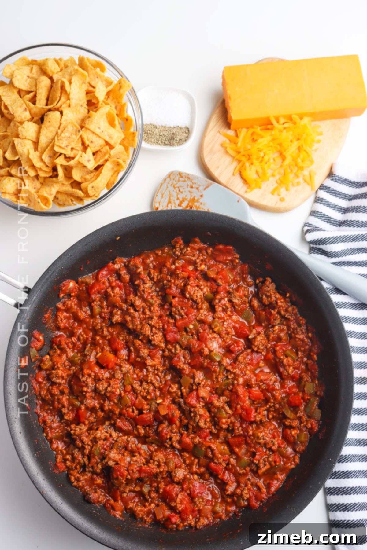 Chili Chip Comfort Bowl 6 Close-up of cooked ground beef chili, seasoned and ready for Frito Chili Pie assembly