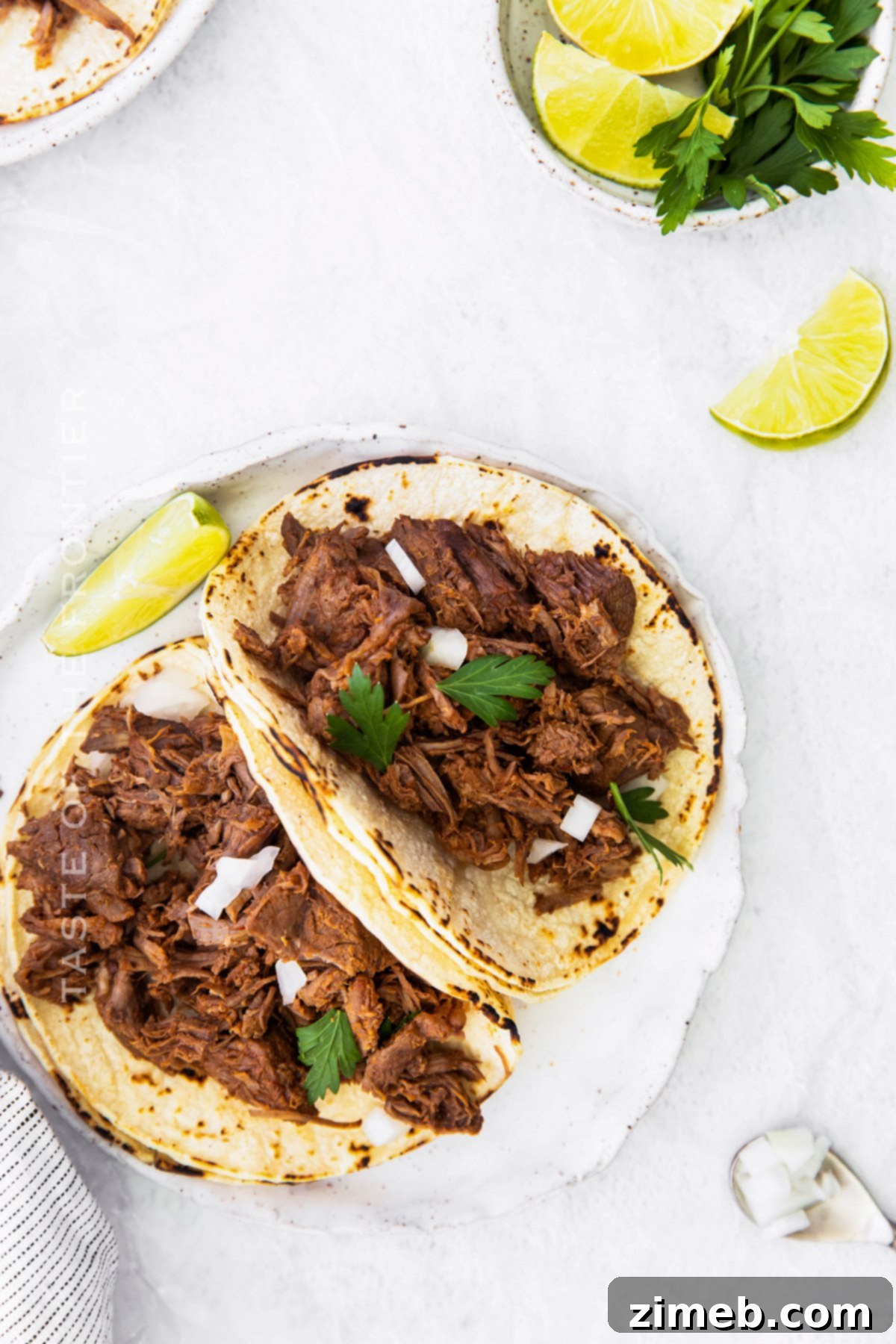 Tender and Flavorful Instant Pot Barbacoa Tacos 3 juicy beef tacos