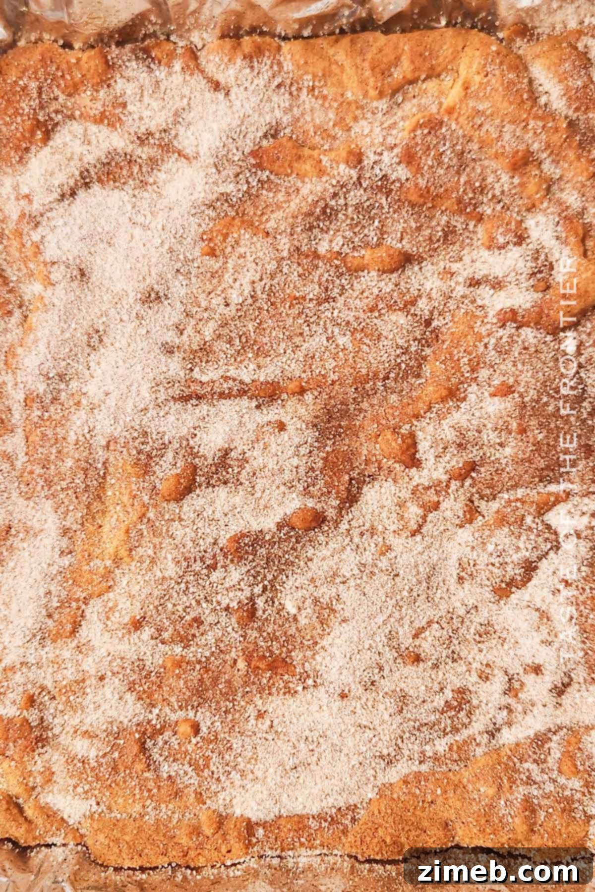 Baked cinnamon bars with churro topping.
