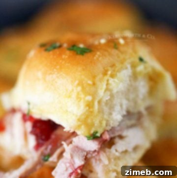 Sweet Hawaiian Cheeseburger Sliders 11 Holiday Leftovers Sliders featuring turkey and cranberry.
