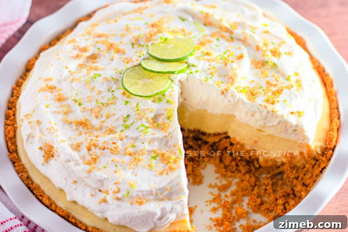 Cloud-Topped Key Lime Pie 8 Classic Key Lime Pie with a perfect slice