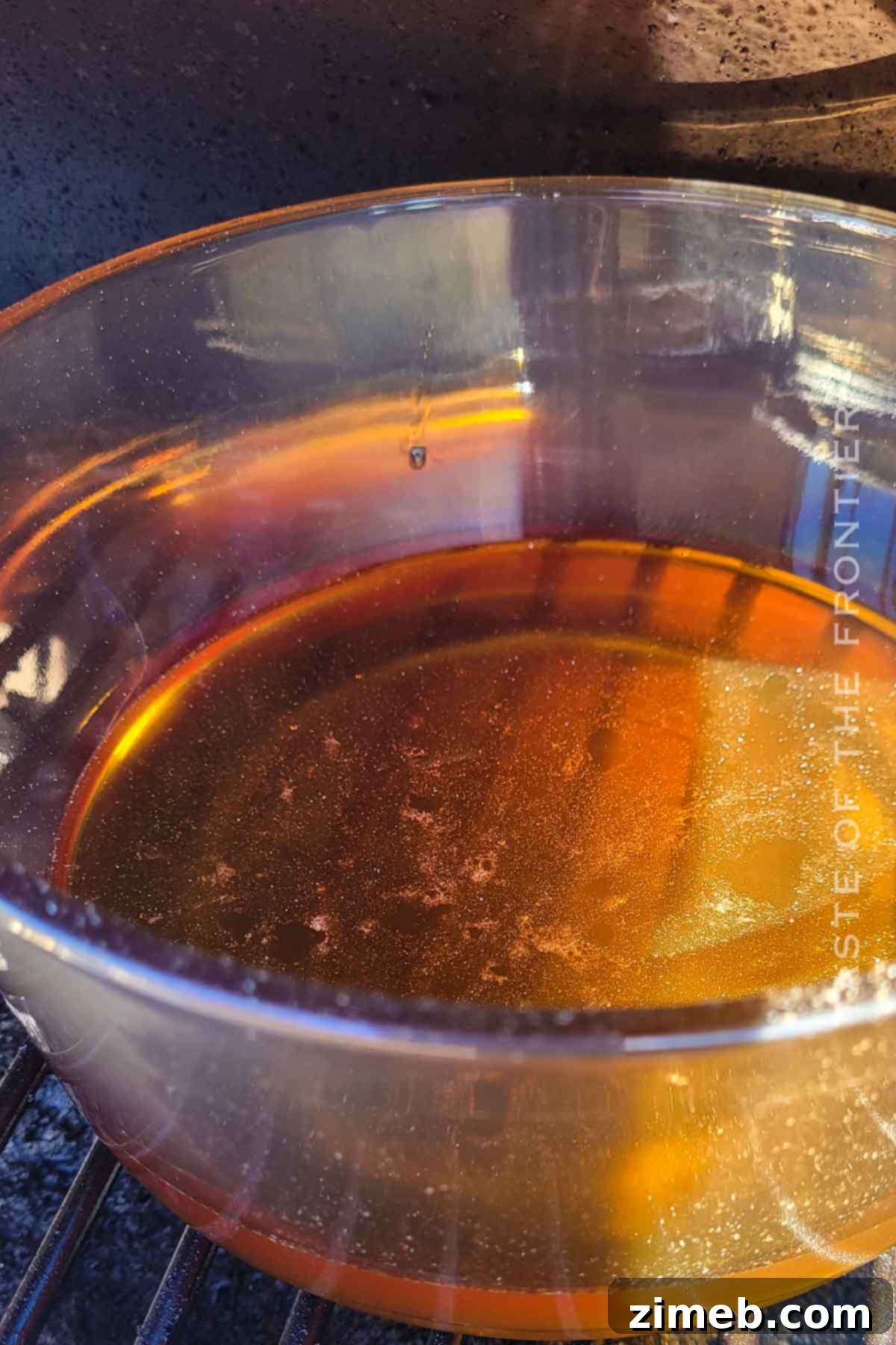 Embered Nectar 6 How to make Smoked Honey - Raw honey in a glass dish, ready to be placed in the smoker