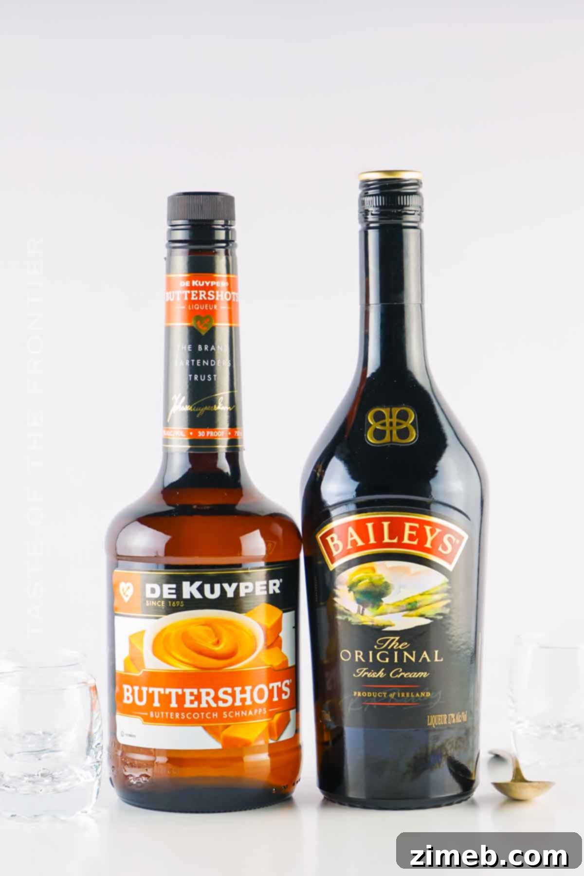 Arrangement of Buttery Nipple Shot Ingredients: Bottles of Butterscotch Schnapps and Bailey's Irish Cream