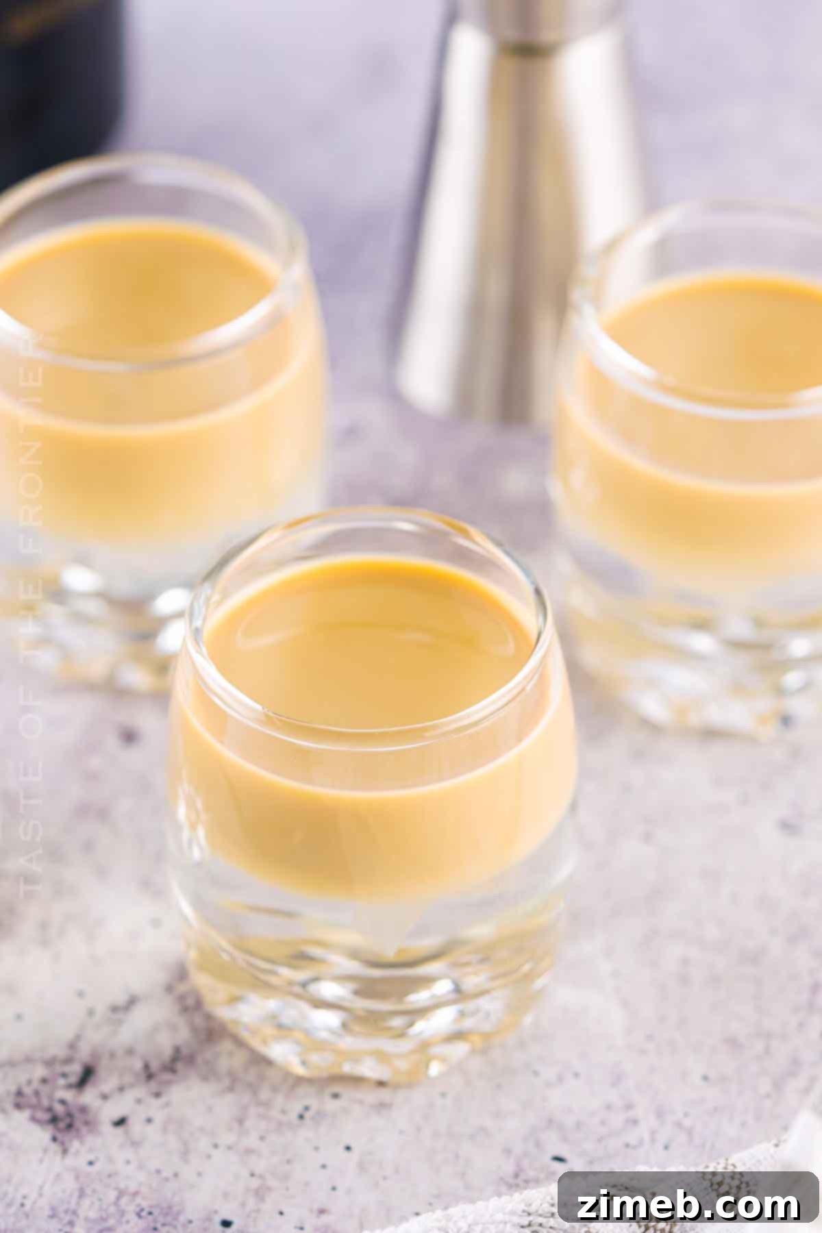 Buttery Nipple Shots cocktail version served in a small glass