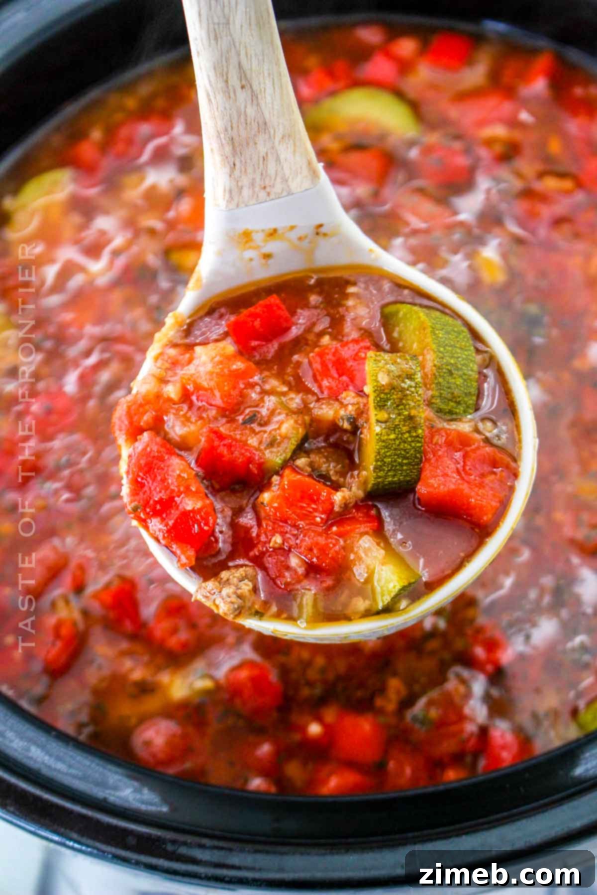 low-carb Zucchini Soup in a bowl with a spoon