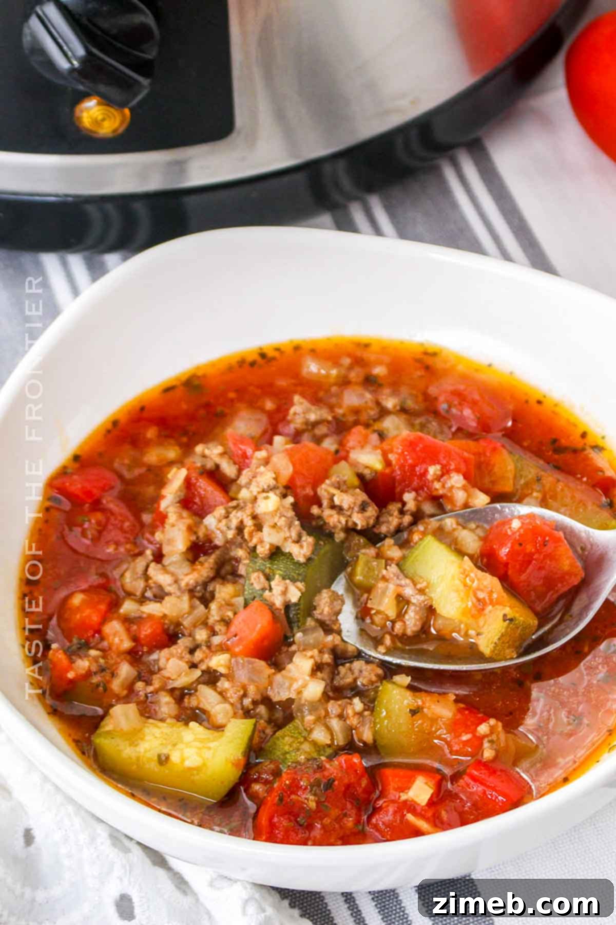 Crockpot Zucchini Soup bubbling in a slow cooker