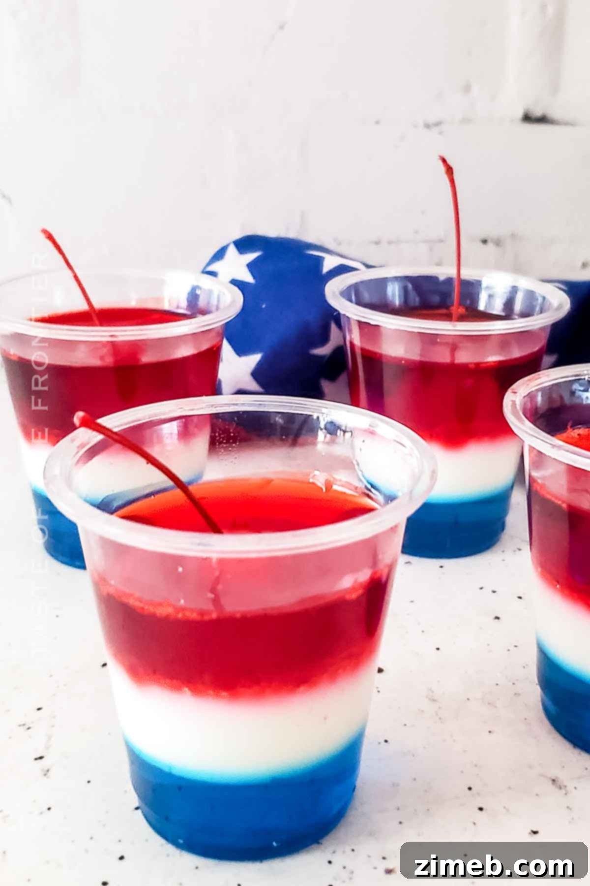 An array of Bomb Pop Jello Shots on a tray, ready for a patriotic celebration.