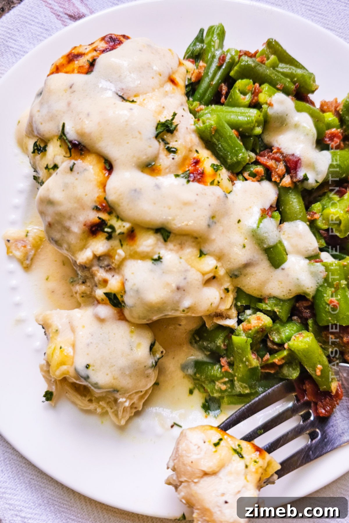 Creamy Mushroom Chicken 15 Chicken dinner served with sauce and a side salad.