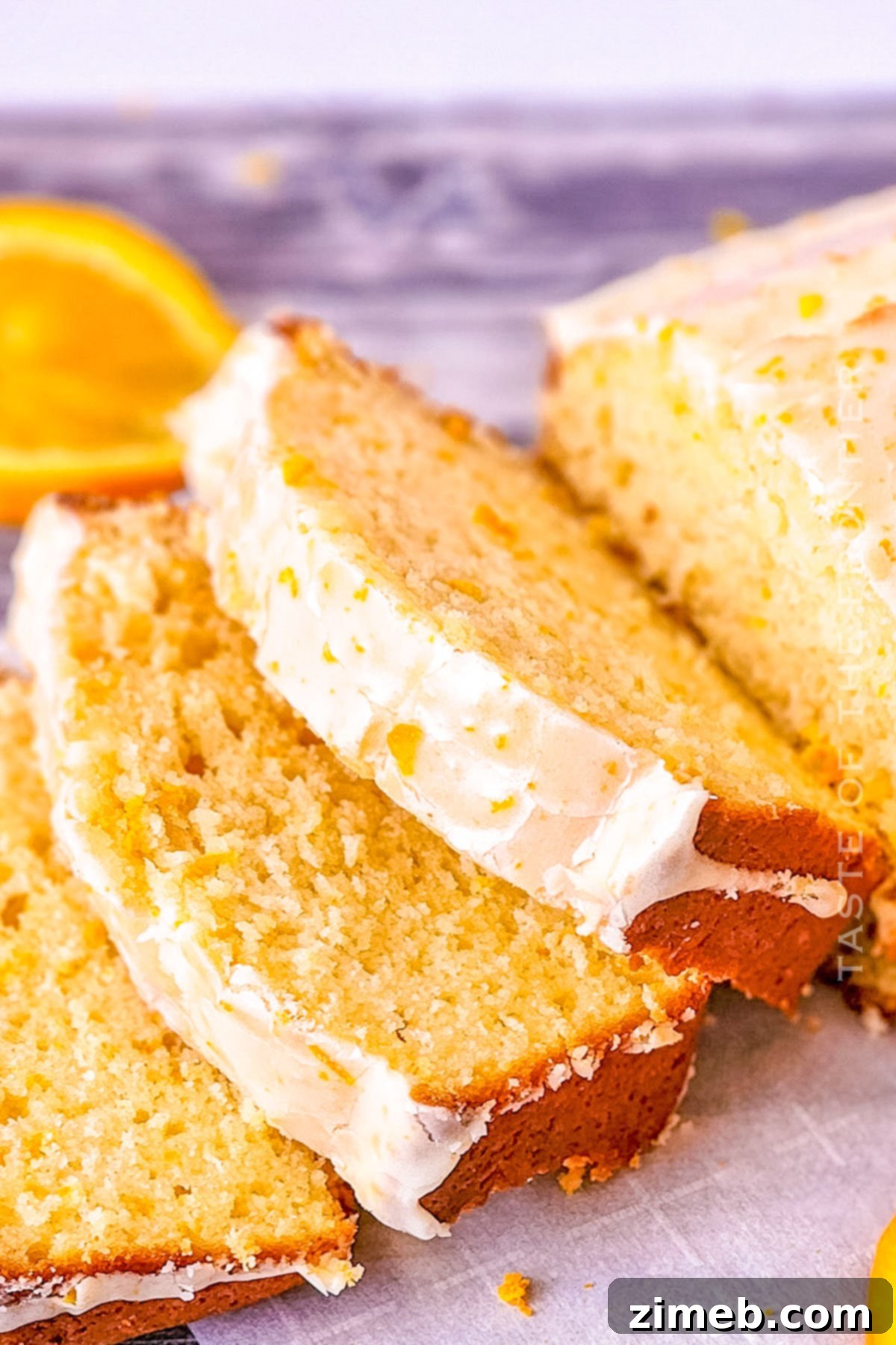 Zesty Orange Loaf 6 A selection of fresh oranges and orange slices for an easy orange cake.