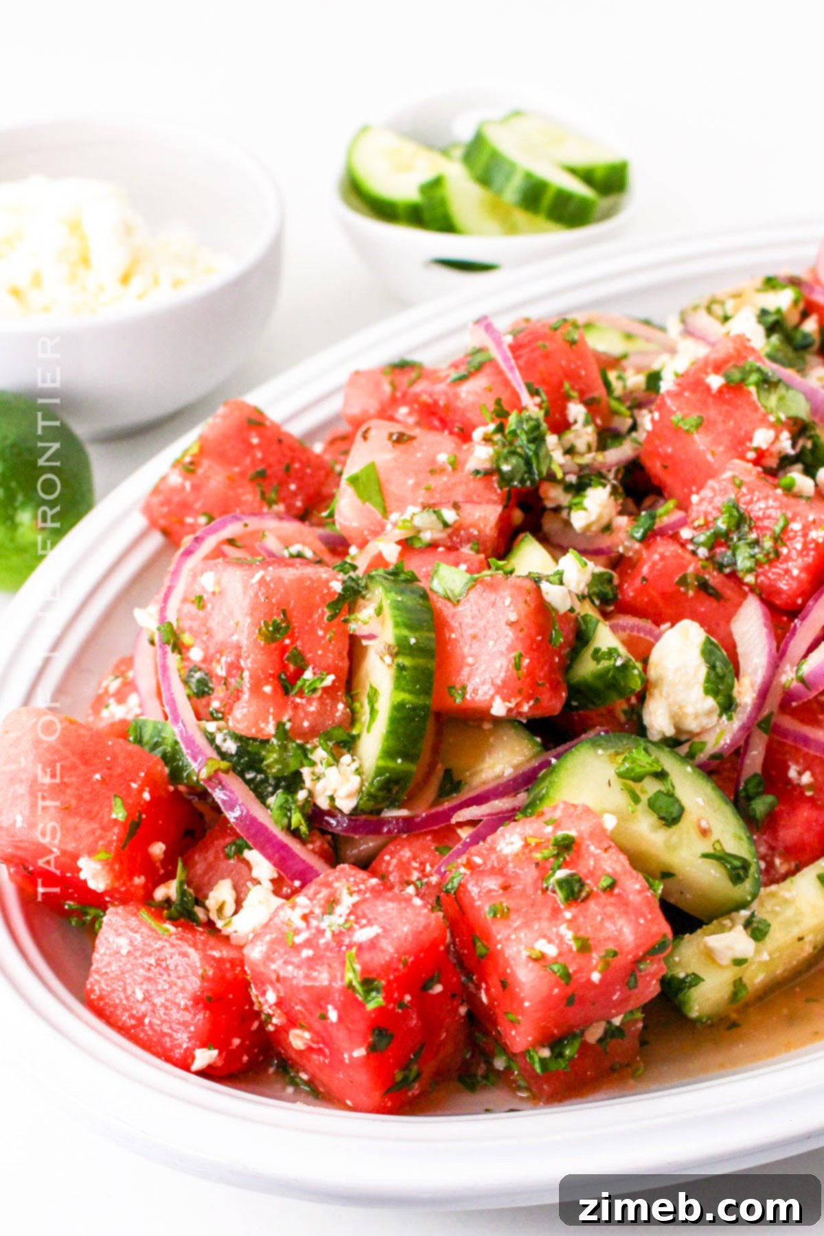 Close-up of Watermelon Salad with Goat Cheese recipe, showing fresh ingredients.