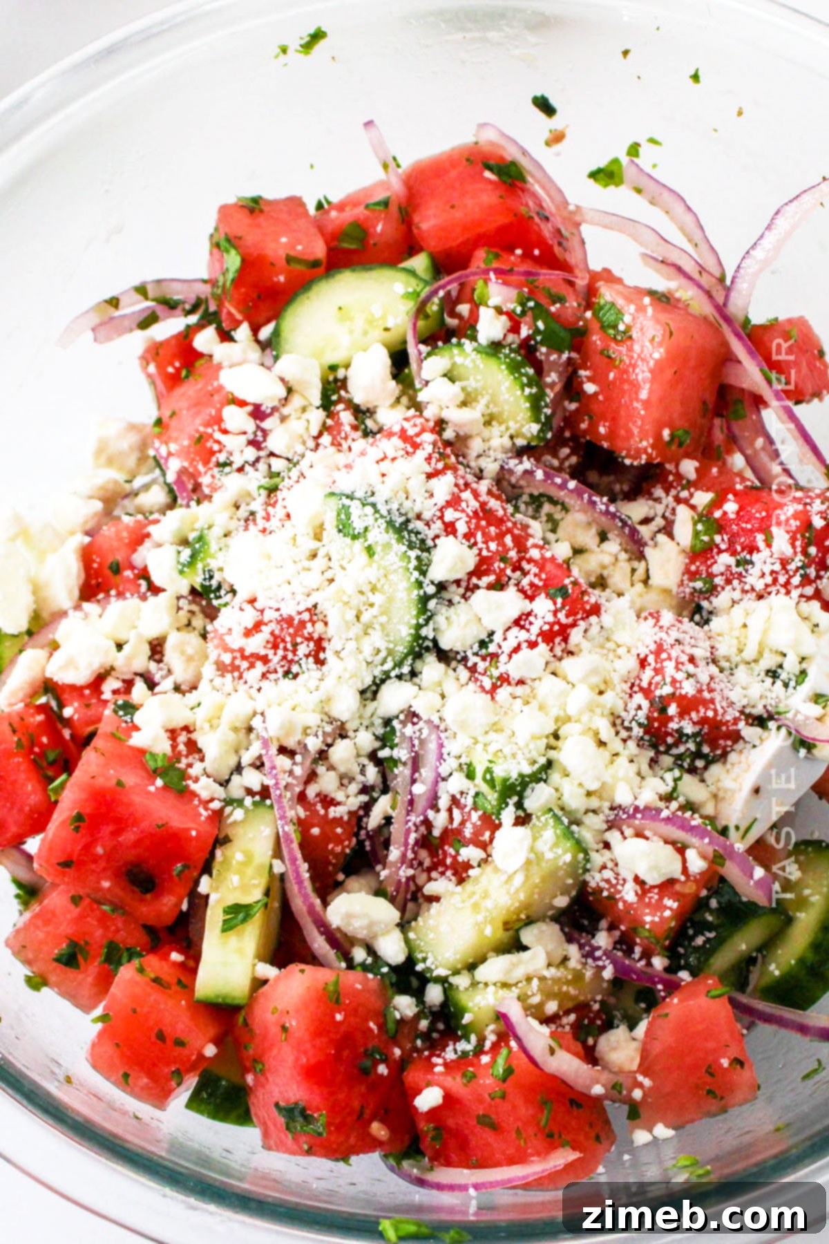 Detailed shot of the assembled Watermelon Salad with Goat Cheese in a serving bowl.